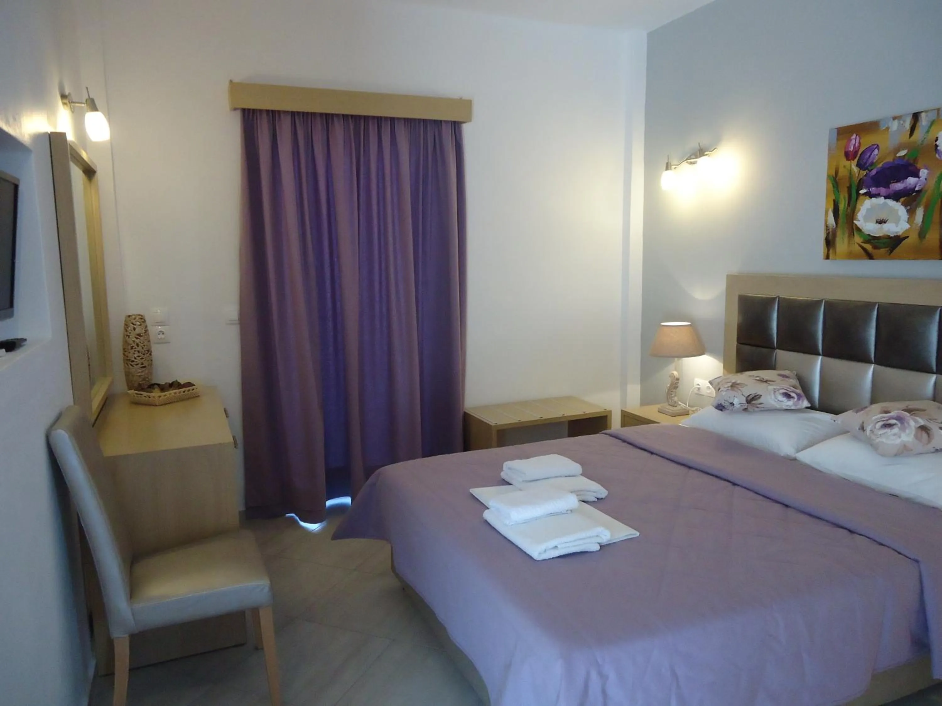 Bedroom in Rita's Place Hotel