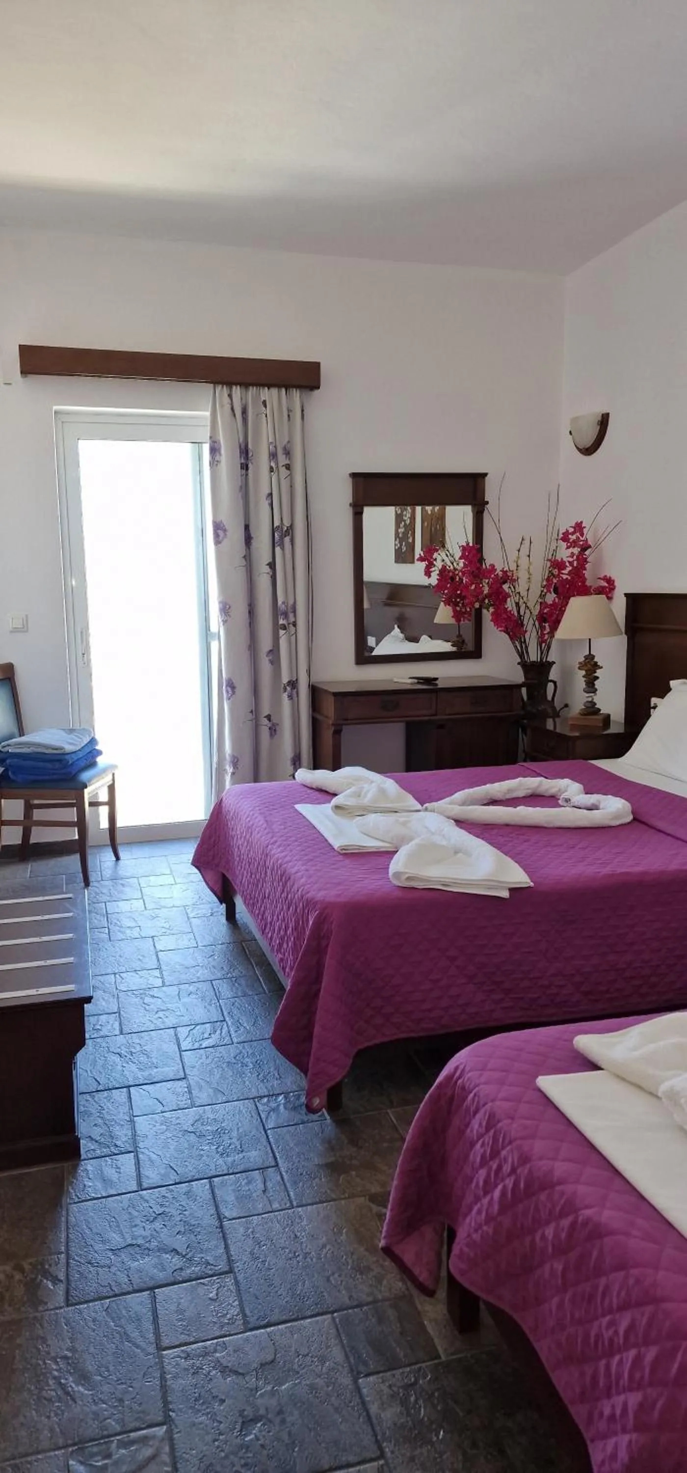 Bed in Rita's Place Hotel