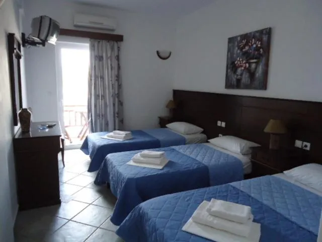 Bedroom in Rita's Place Hotel