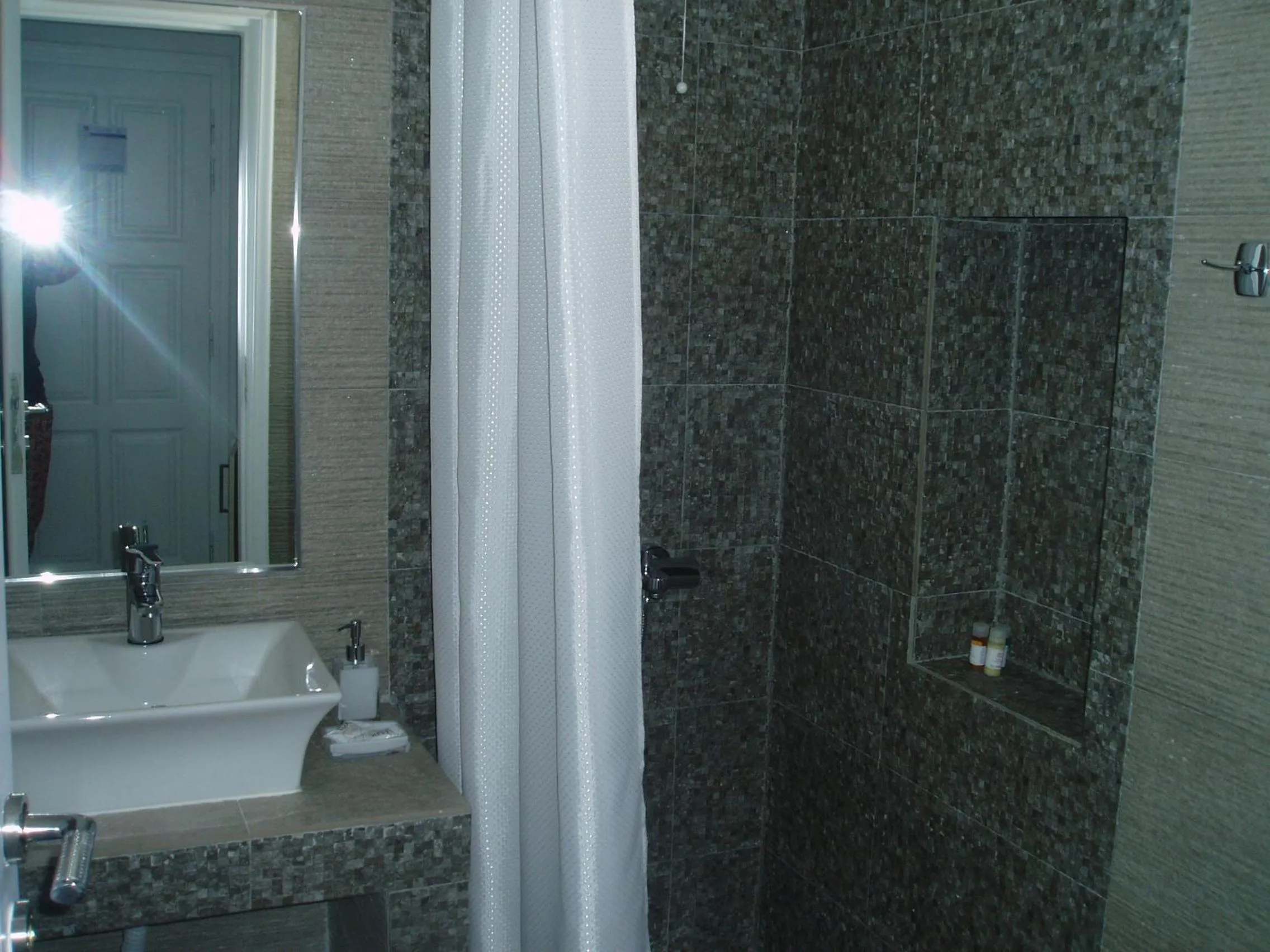 Bathroom in Rita's Place Hotel