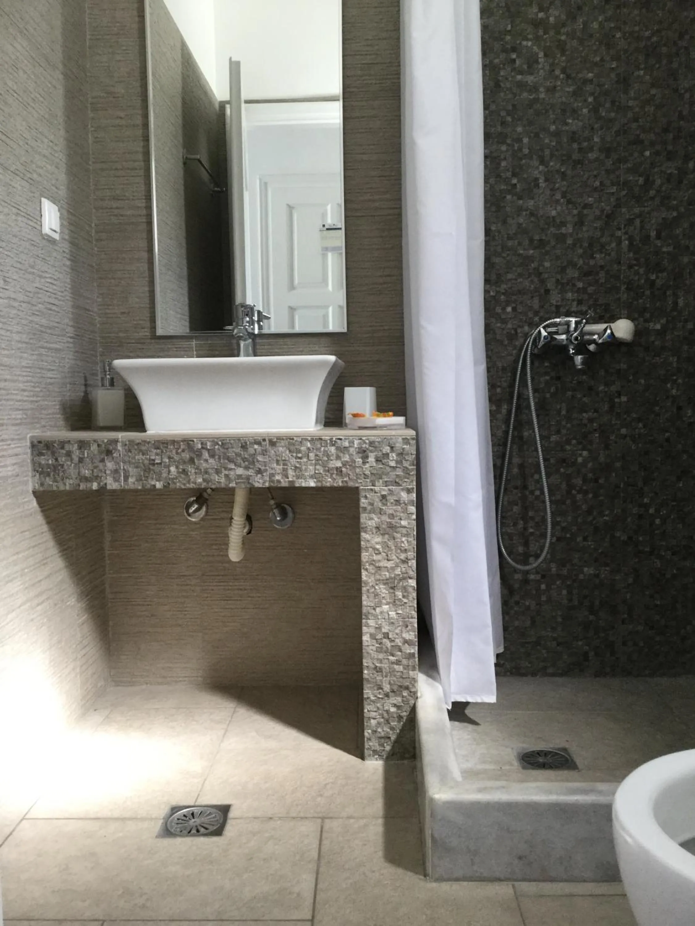 Bathroom in Rita's Place Hotel