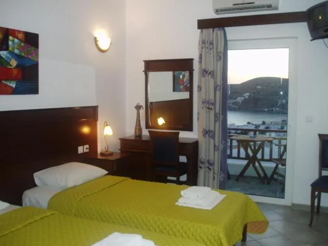 Bedroom in Rita's Place Hotel