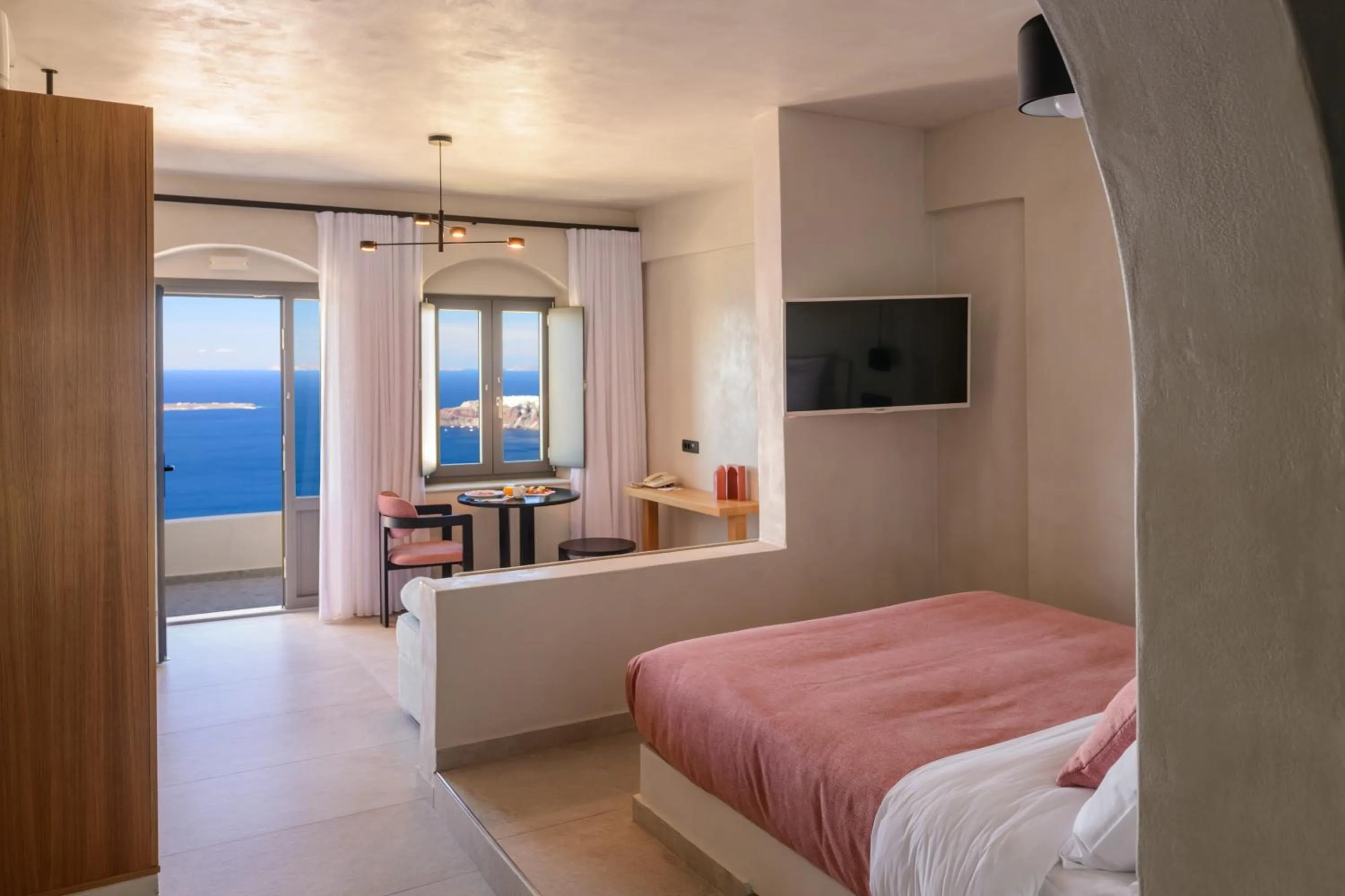 Communal lounge/ TV room, Bed in Andromeda Villas & Spa Resort