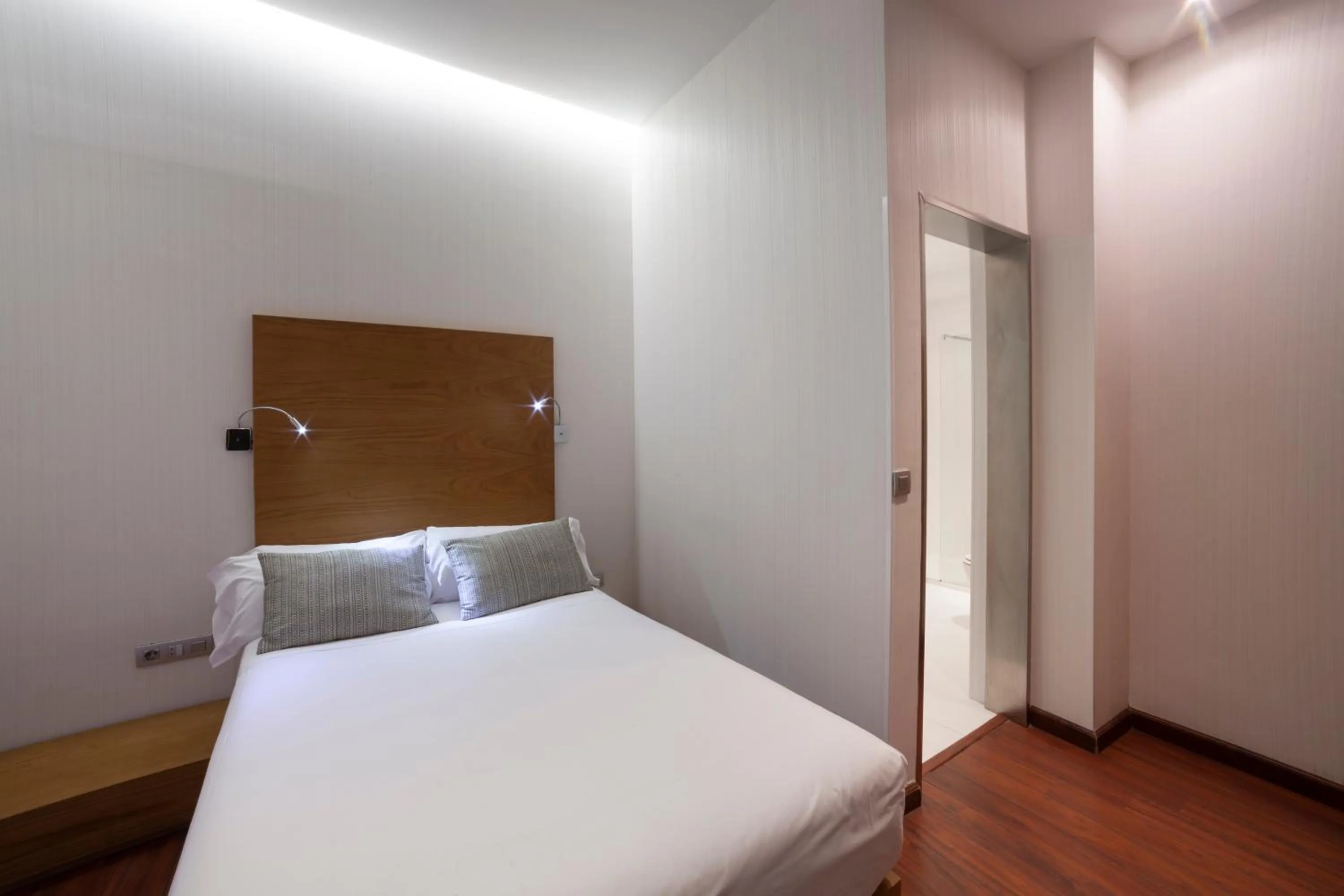 Bed in Petit Palace Plaza Málaga