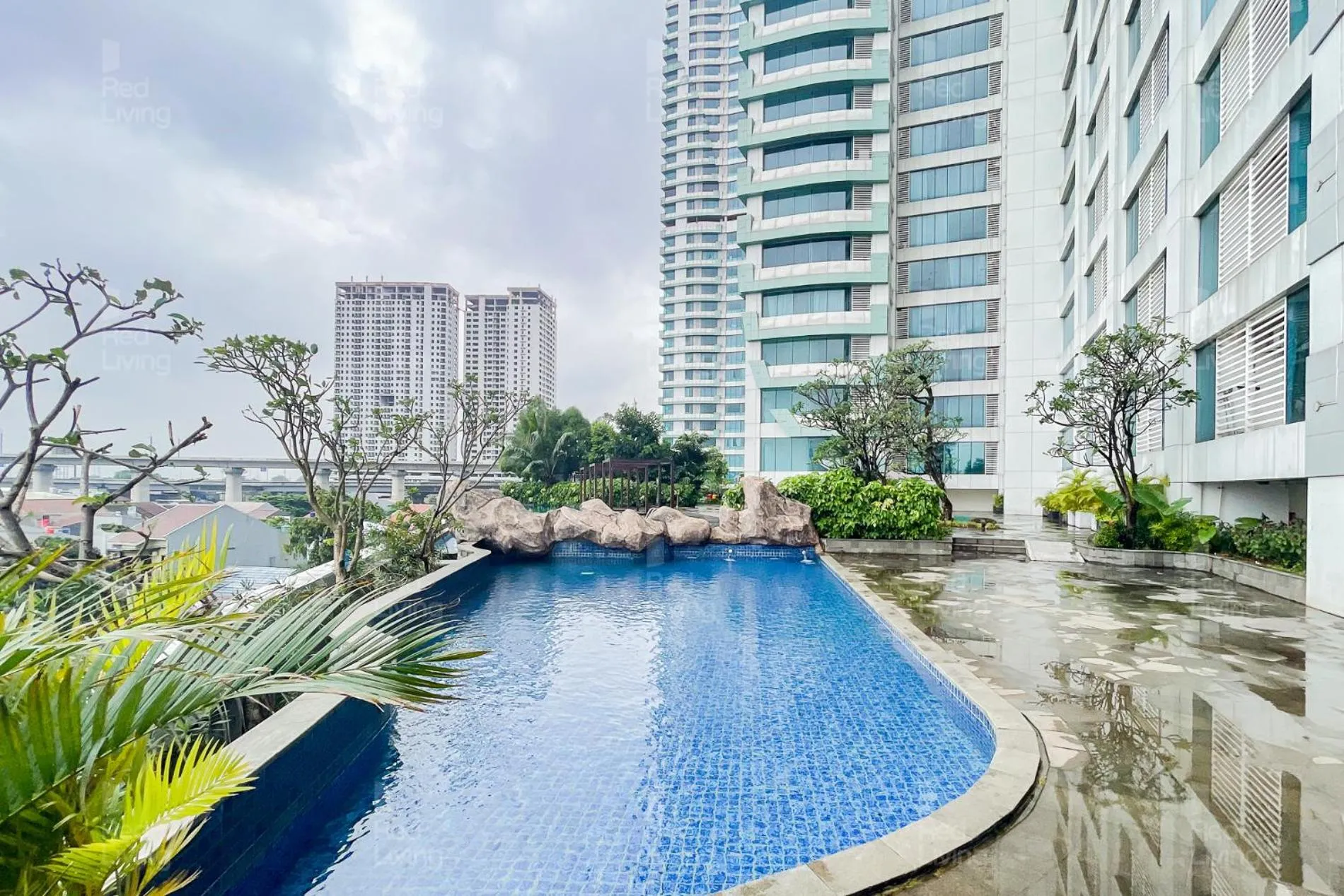 Property building in RedLiving Apartemen Grand Kamala Lagoon - Aoklah Property Tower Barclay North