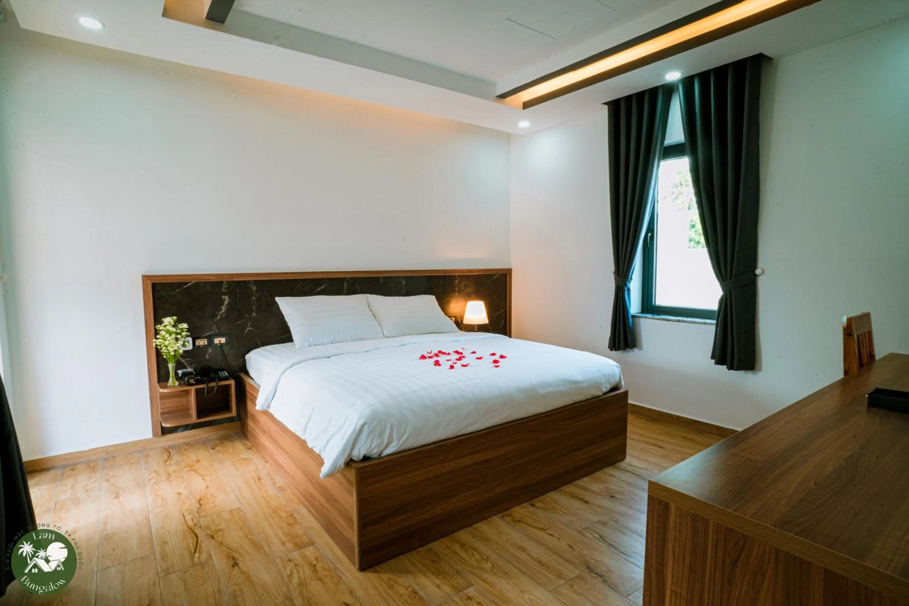 Bed in LAM BUNGALOW Resort & Spa