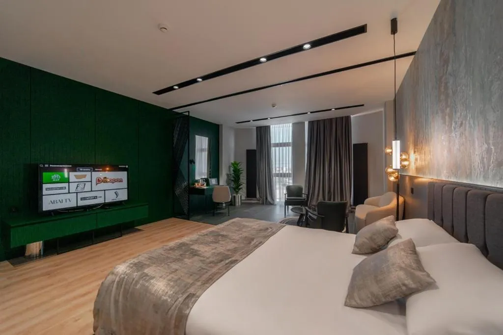 Bed in Dostyk Business Hotel