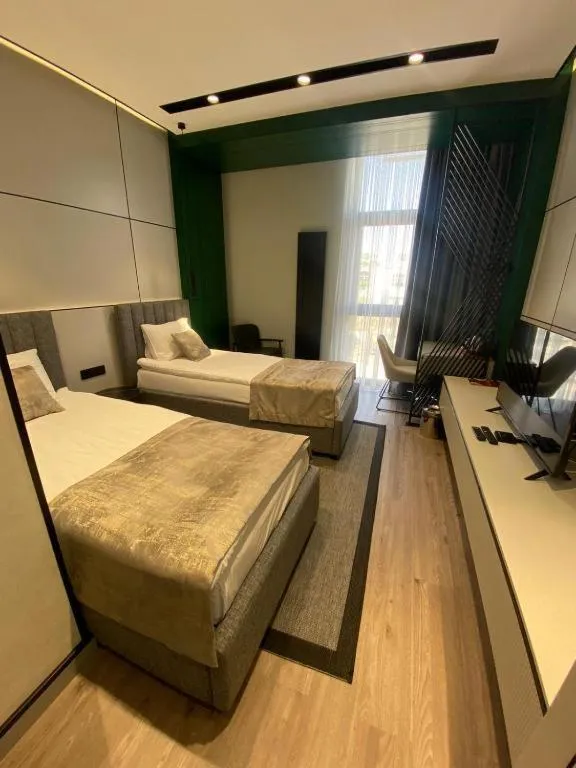 Bed in Dostyk Business Hotel