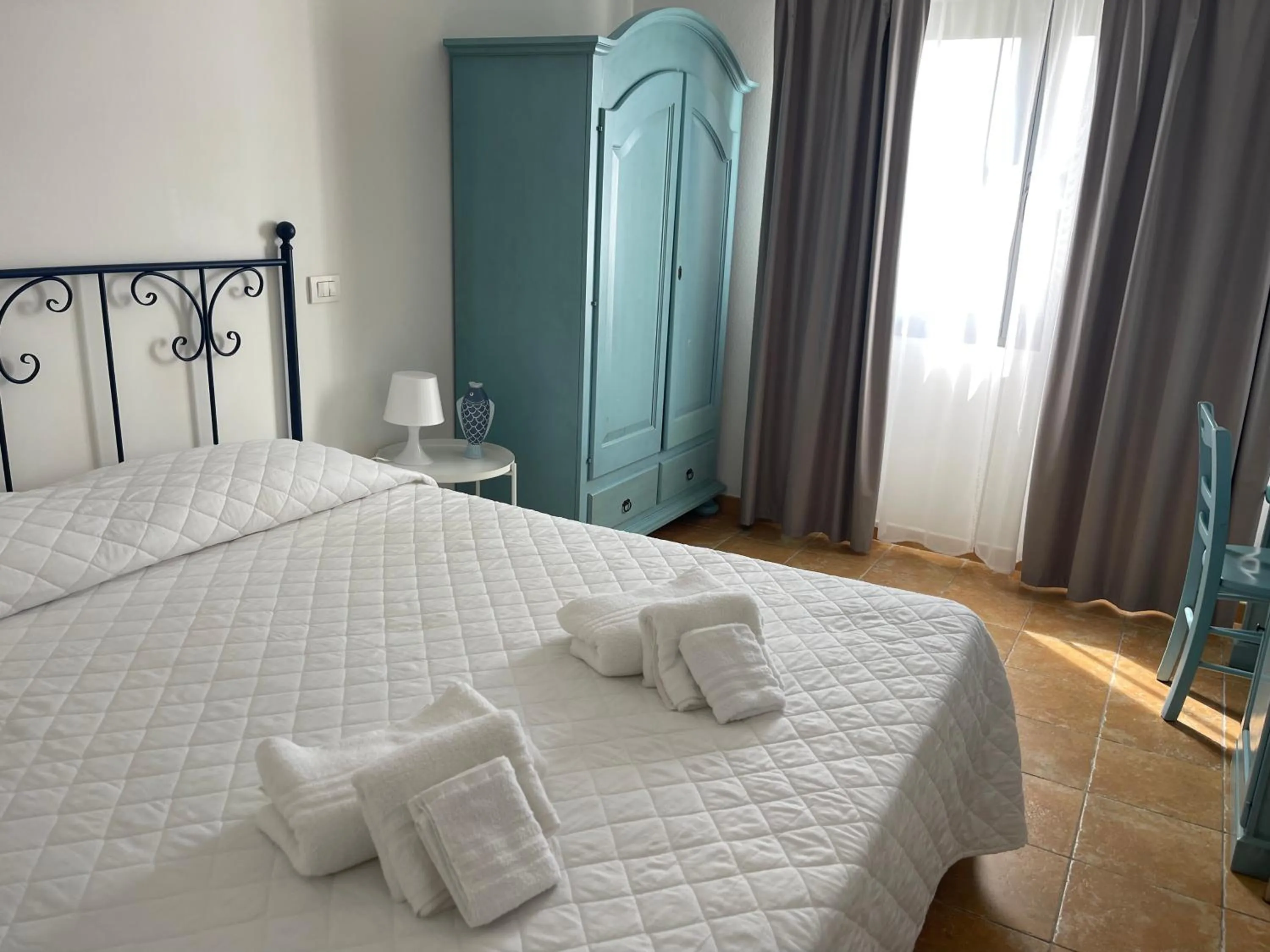 Bedroom in La Smeraldina Resort