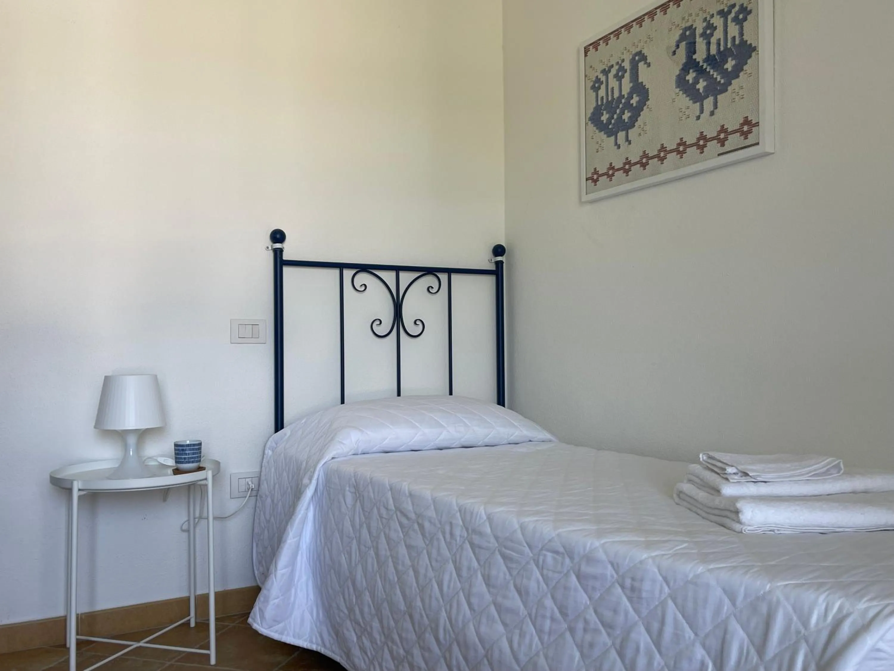 Bedroom in La Smeraldina Resort