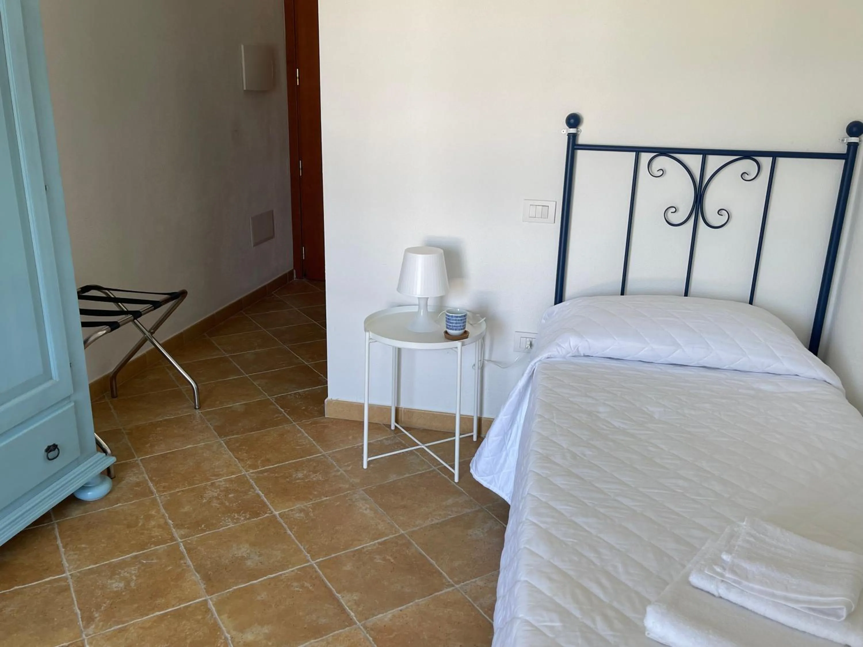 Bedroom in La Smeraldina Resort