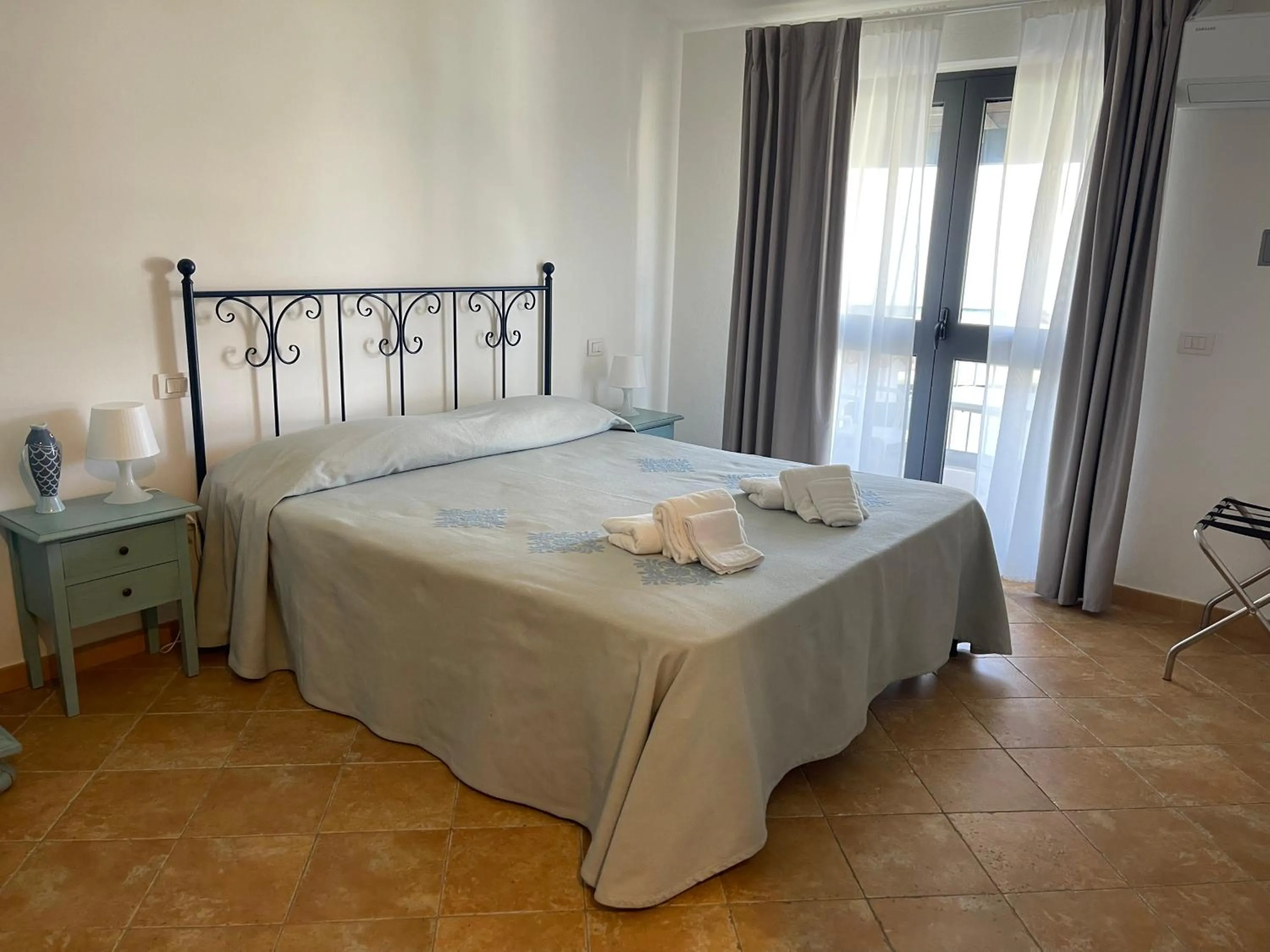 Bedroom in La Smeraldina Resort