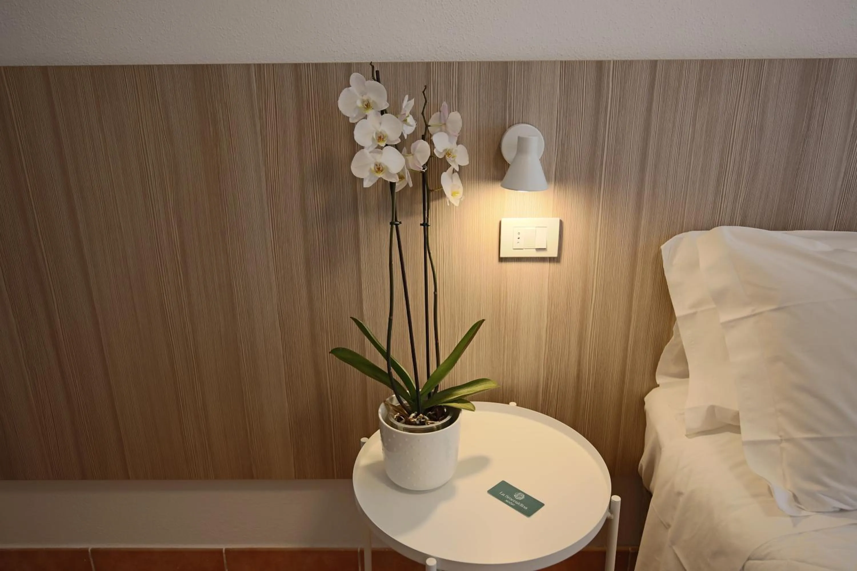 Bed in La Smeraldina Resort