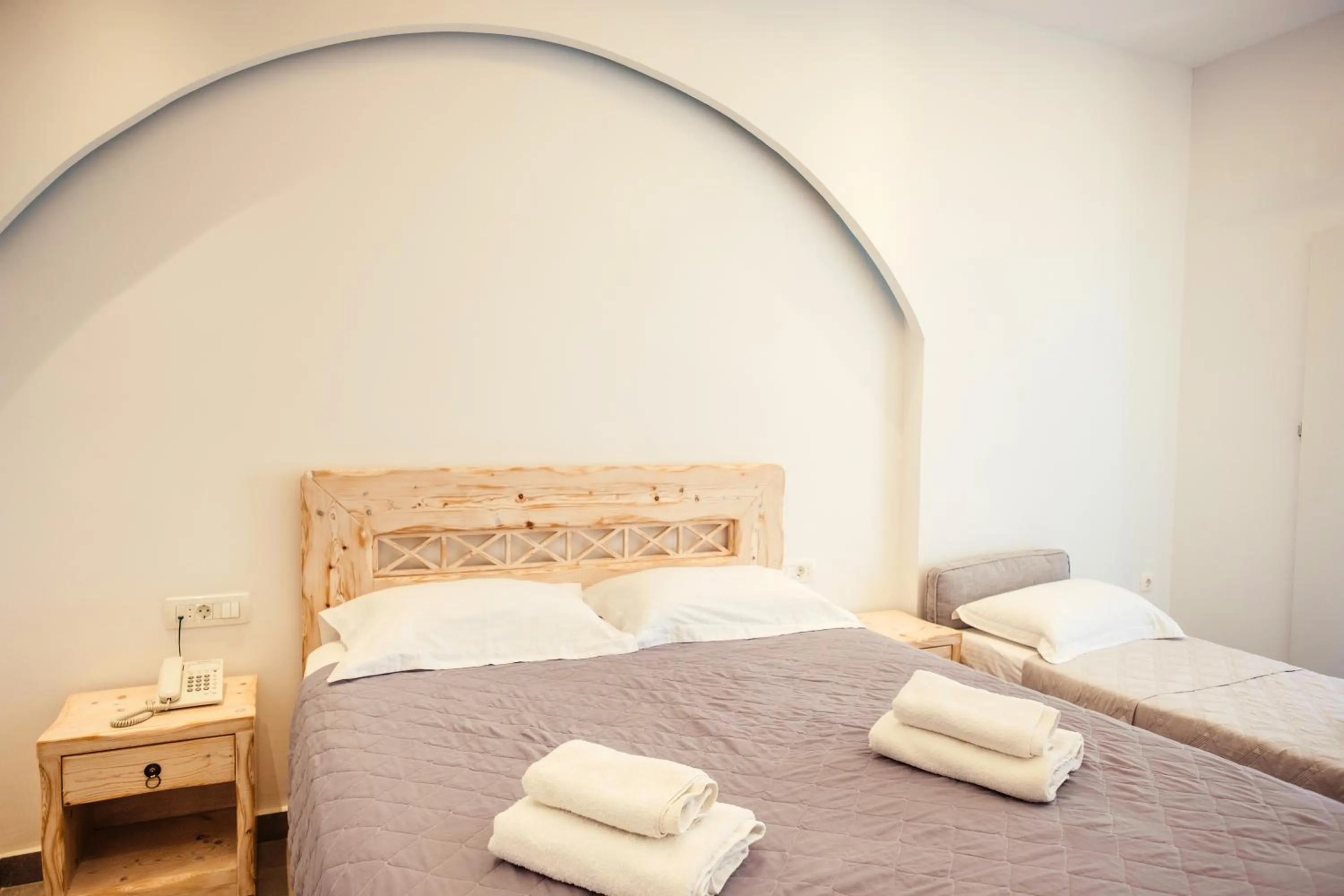 Bed in Cyclades Hotel