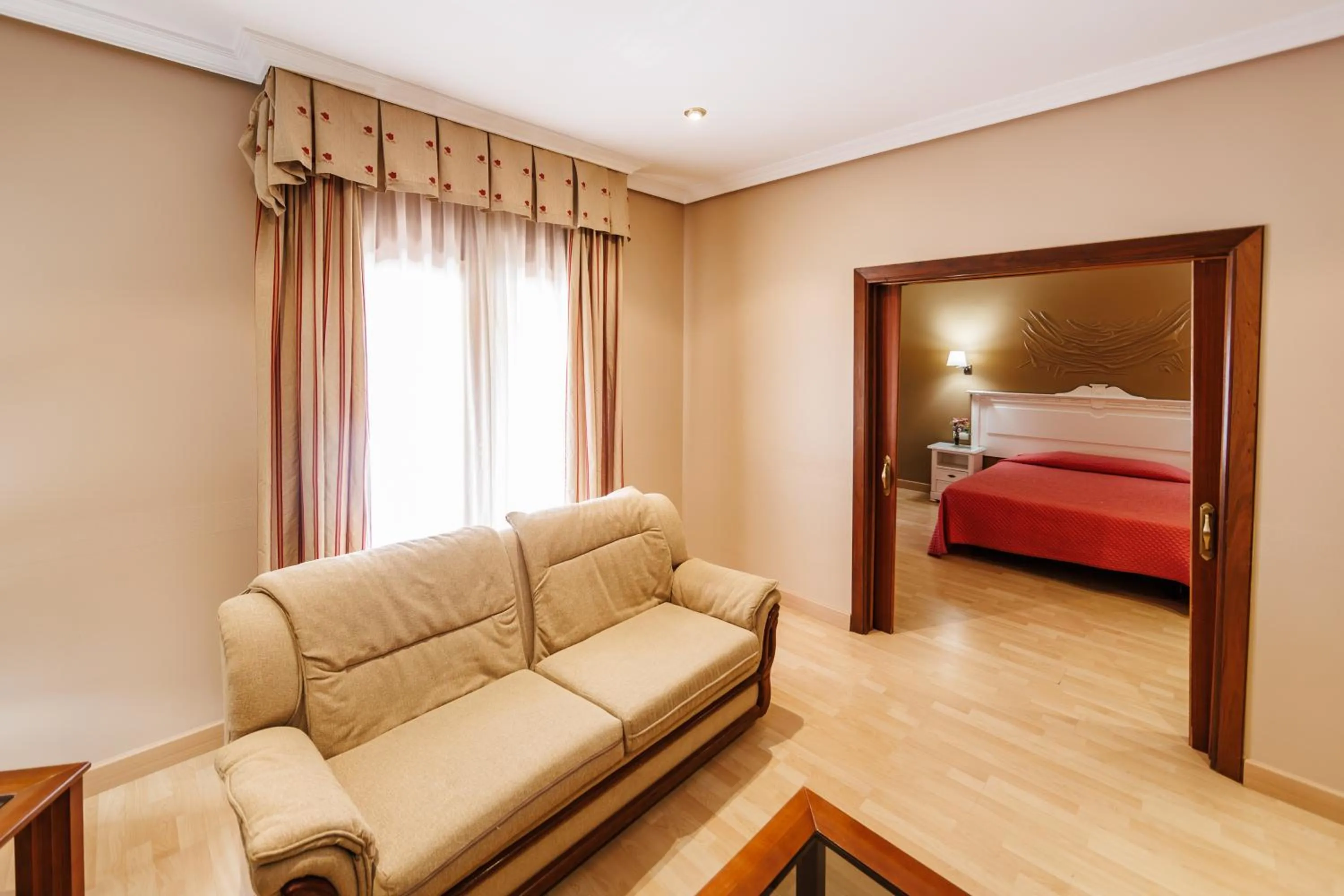 Living room, Bed in Hotel Acosta Vetonia