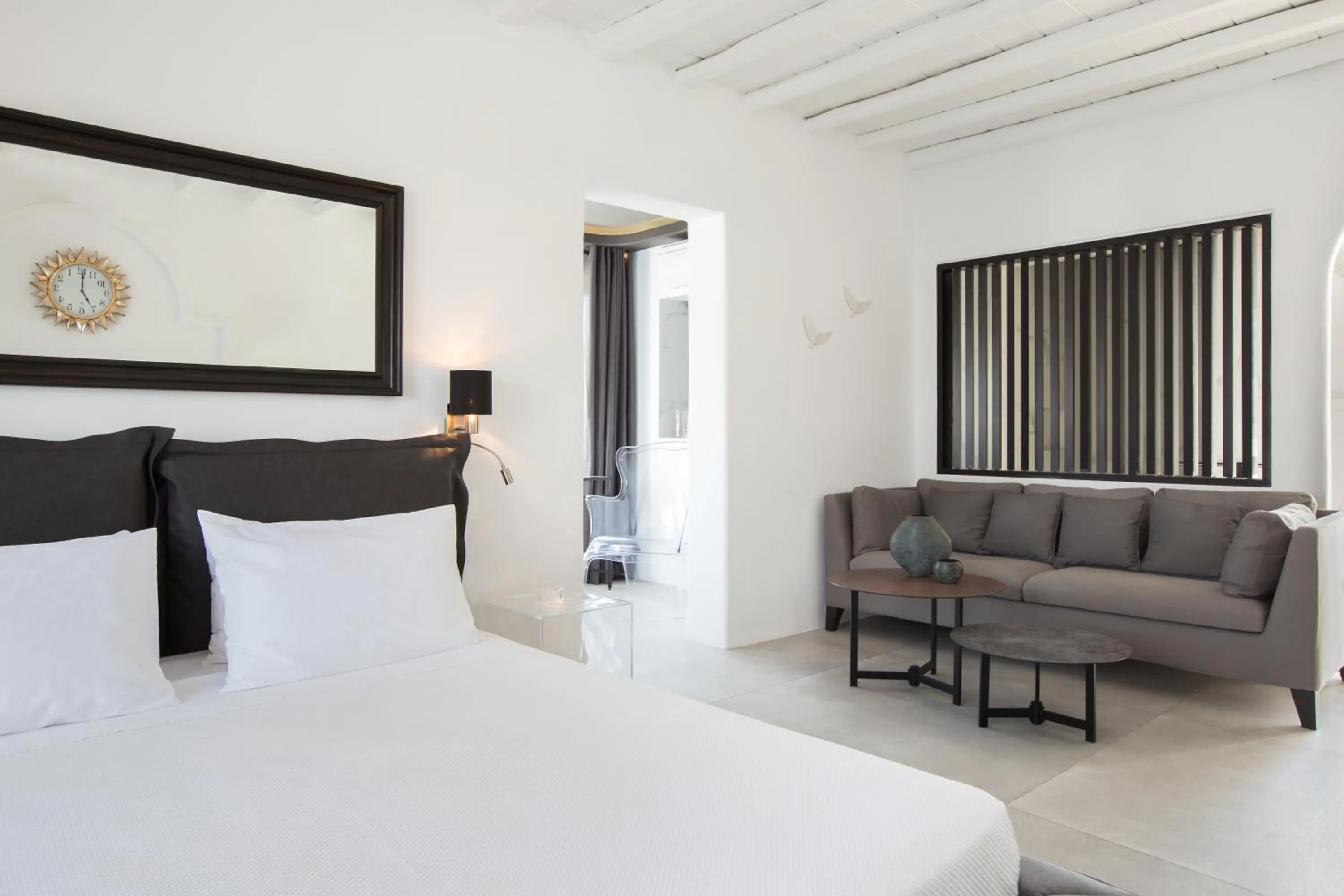 Seating area, Bed in Kivotos Mykonos - Preferred Hotels & Resorts