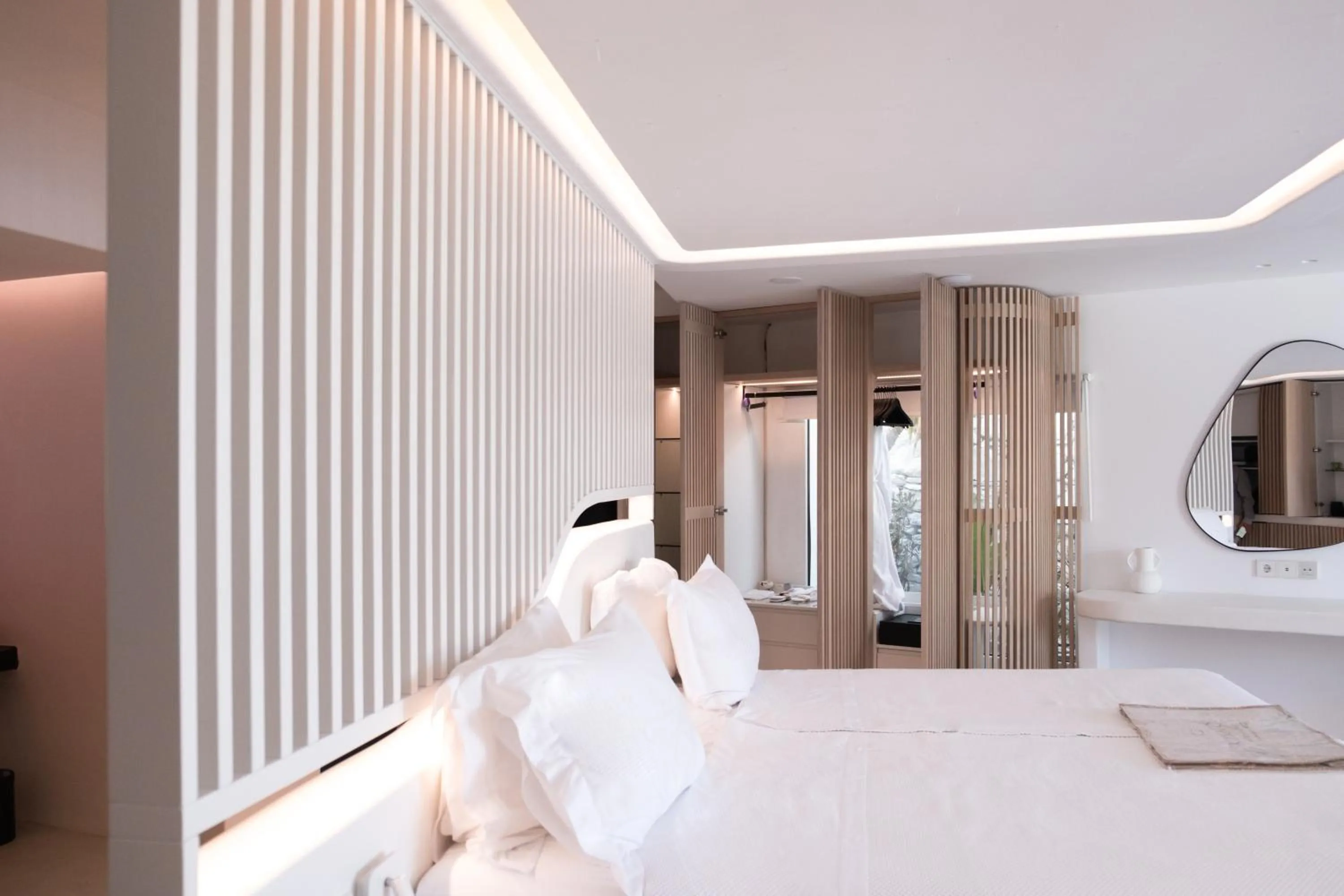 Bedroom, Bed in Kivotos Mykonos - Preferred Hotels & Resorts