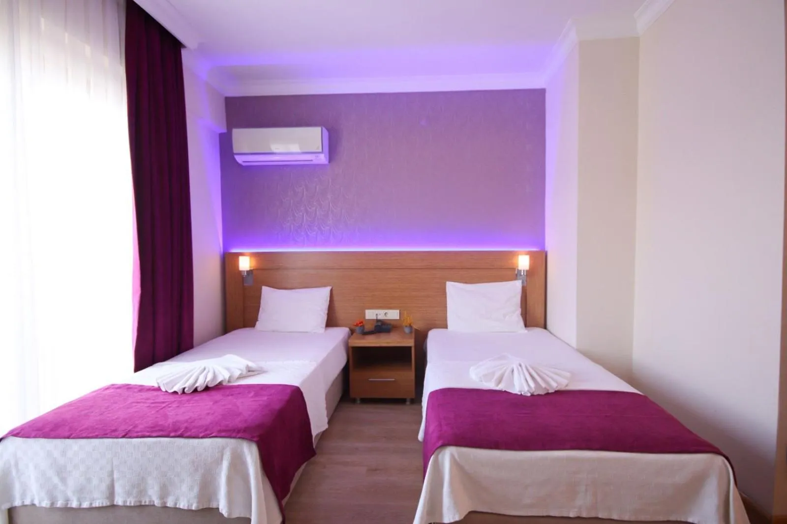 Bed in Siriusmi Hotel