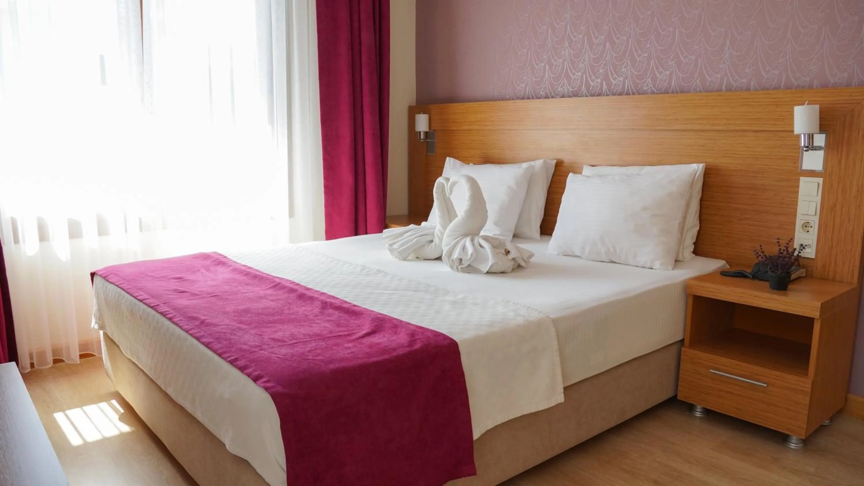 Bed in Siriusmi Hotel