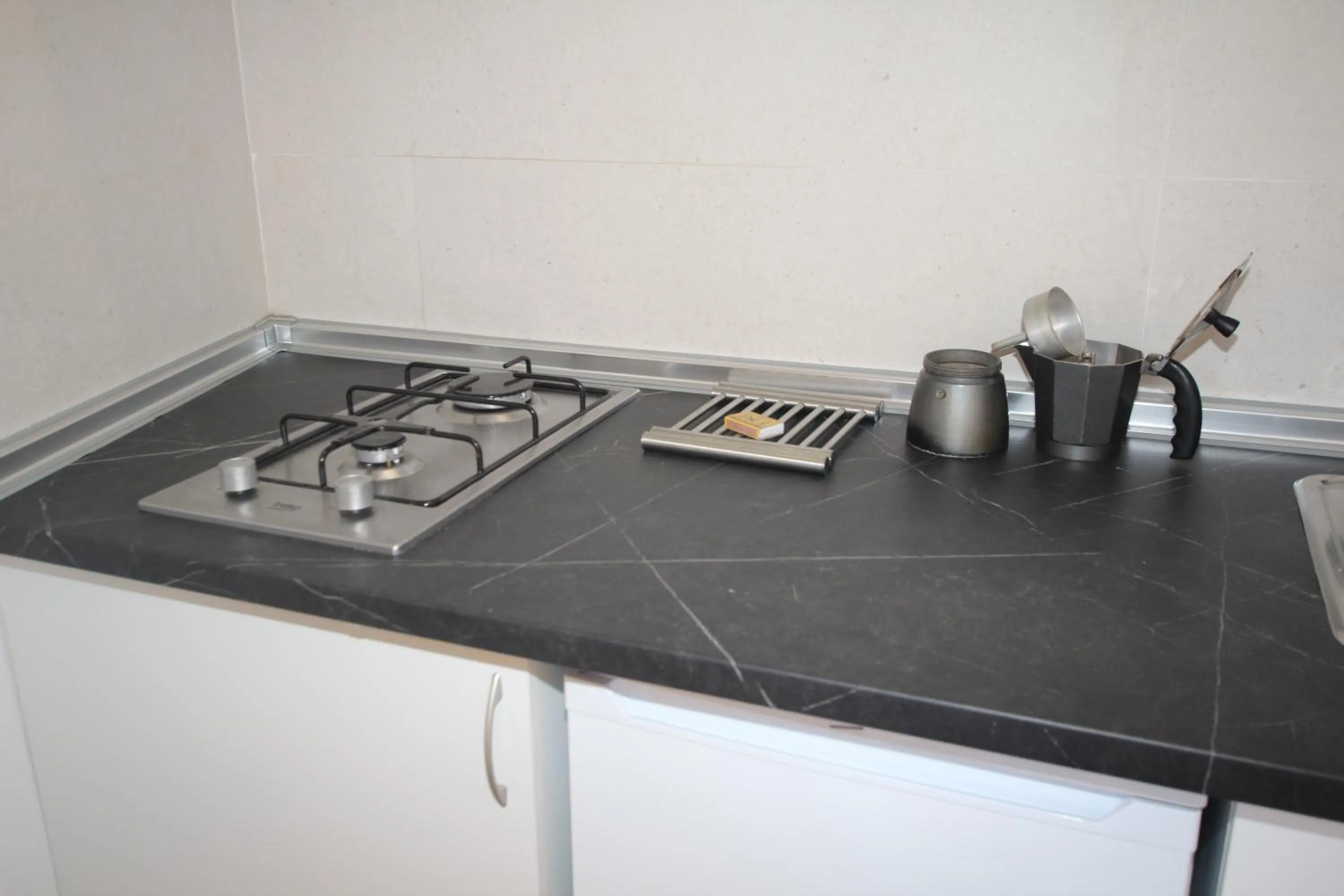 Kitchen or kitchenette in Apartamentos El Sol II