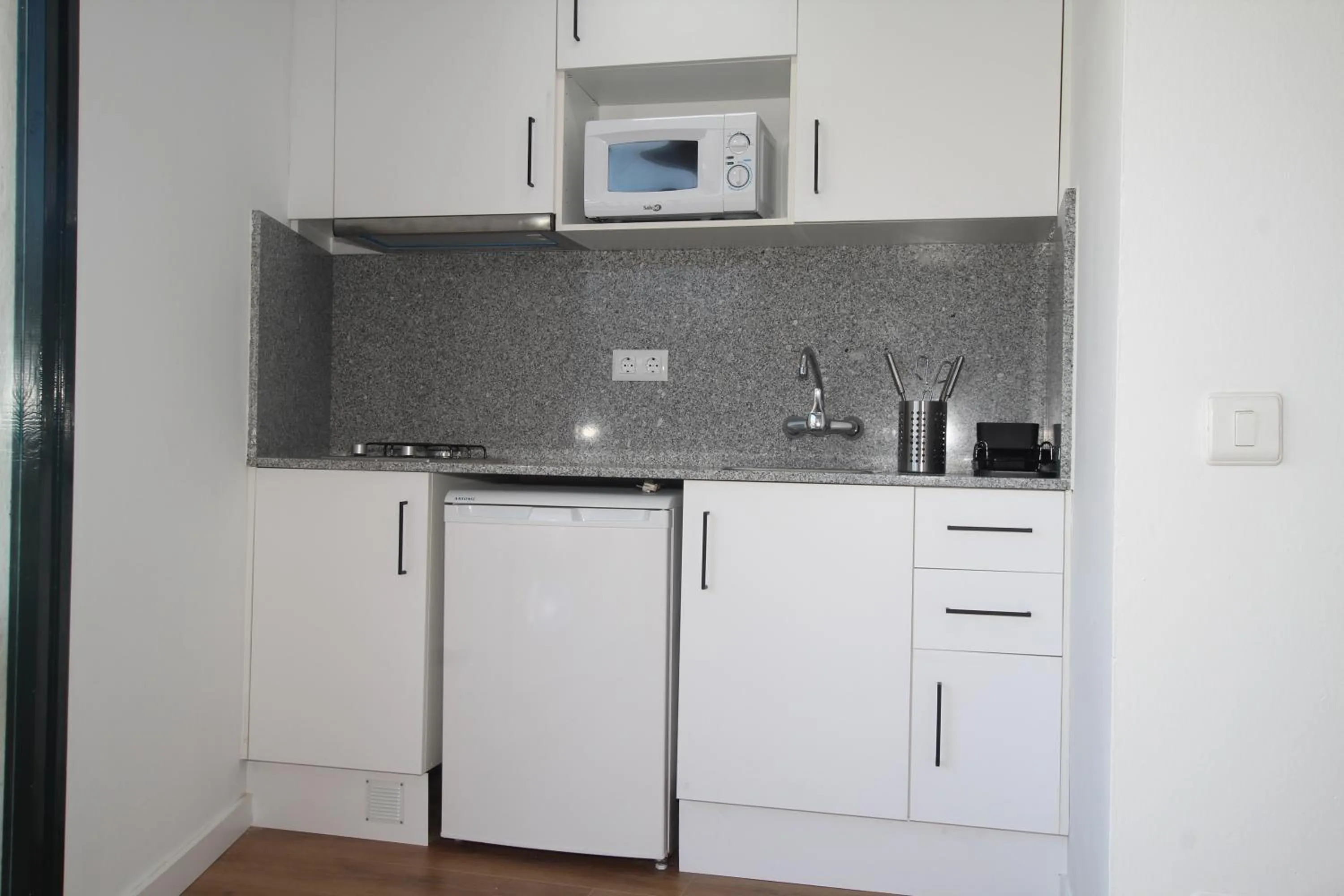 Kitchen or kitchenette in Apartamentos El Sol II