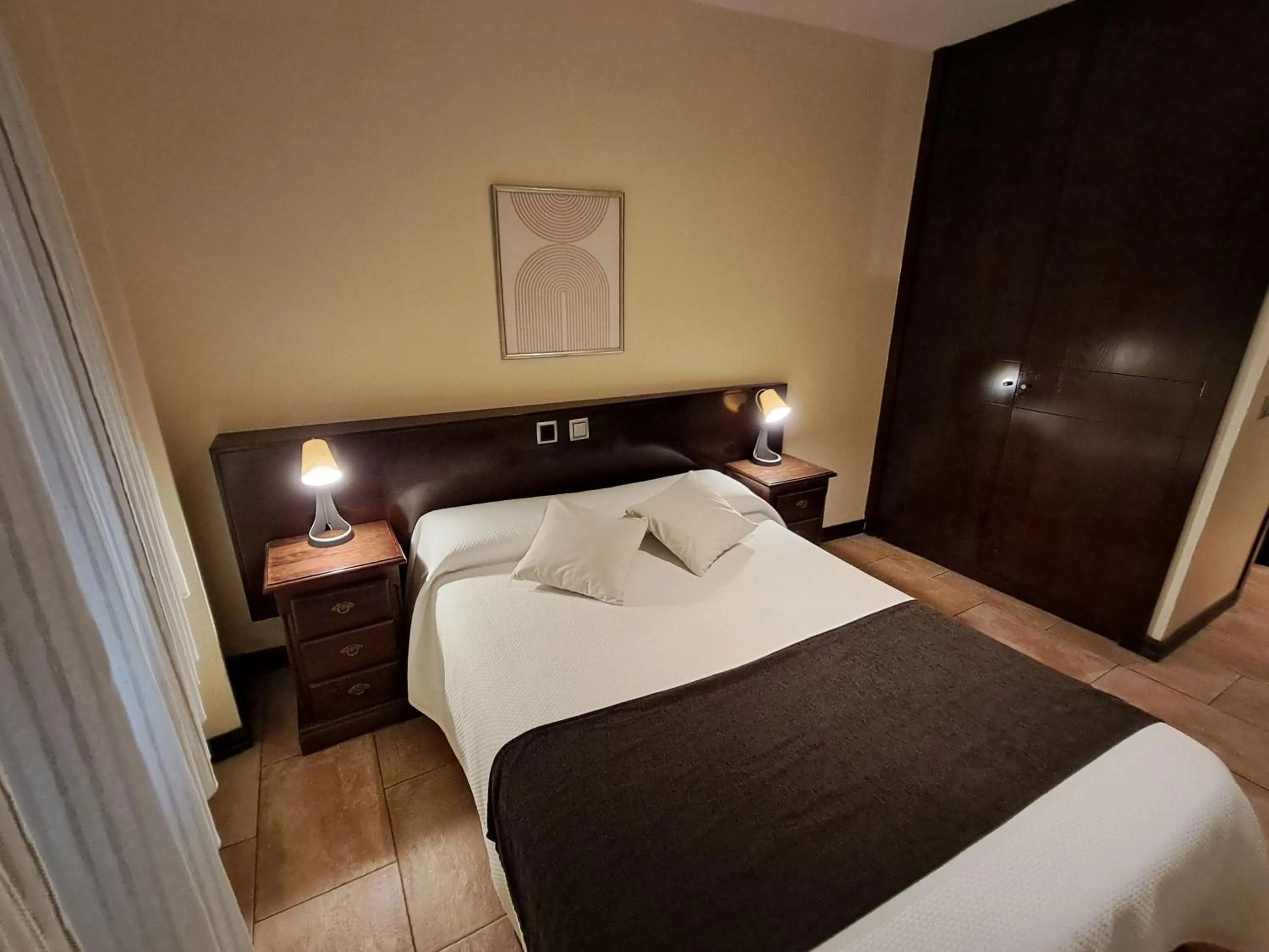 Bed in Hotel Complutense