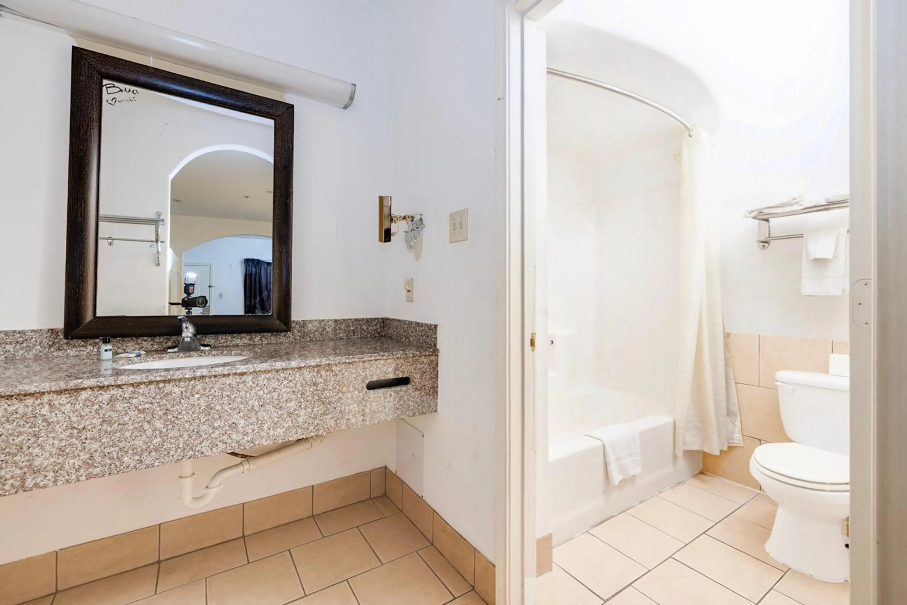 Bathroom in Capital O Deluxe Inn Channelview Houston I-10