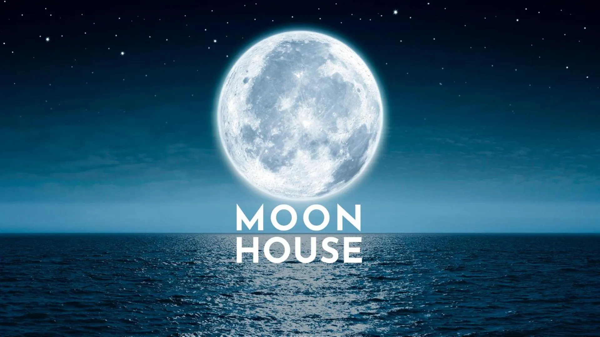 Property logo or sign in Moon House F4: Spacious 3-Bedroom Apartment in Downtown