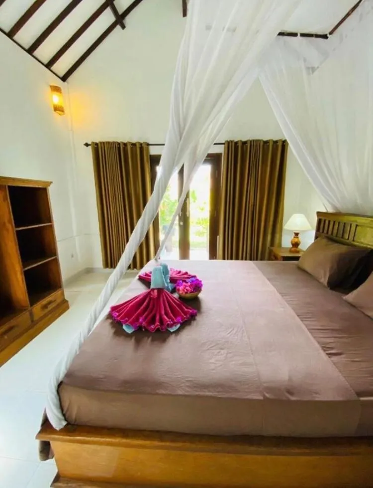 Bed in Puring Bungalows
