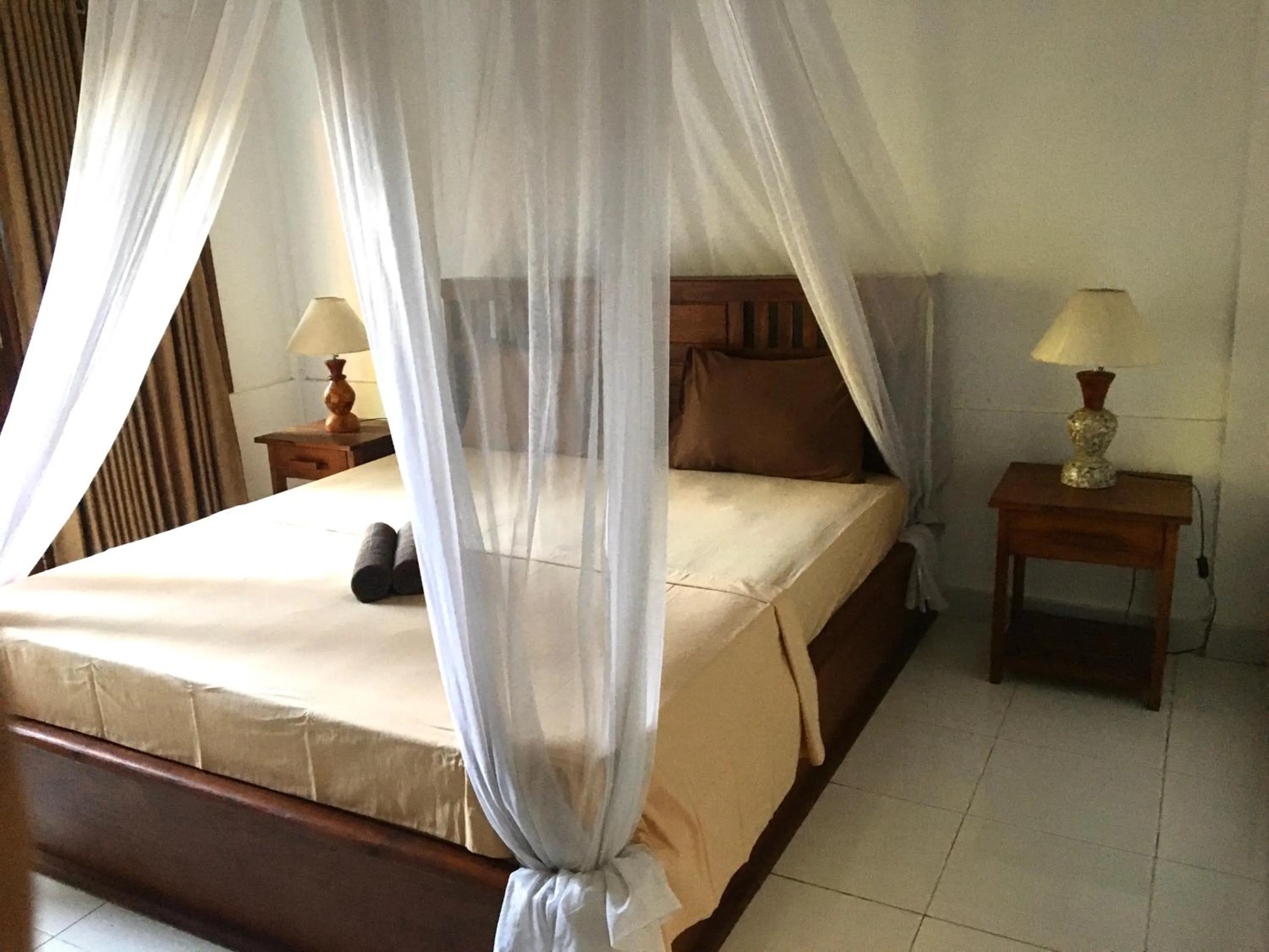 Bed in Puring Bungalows