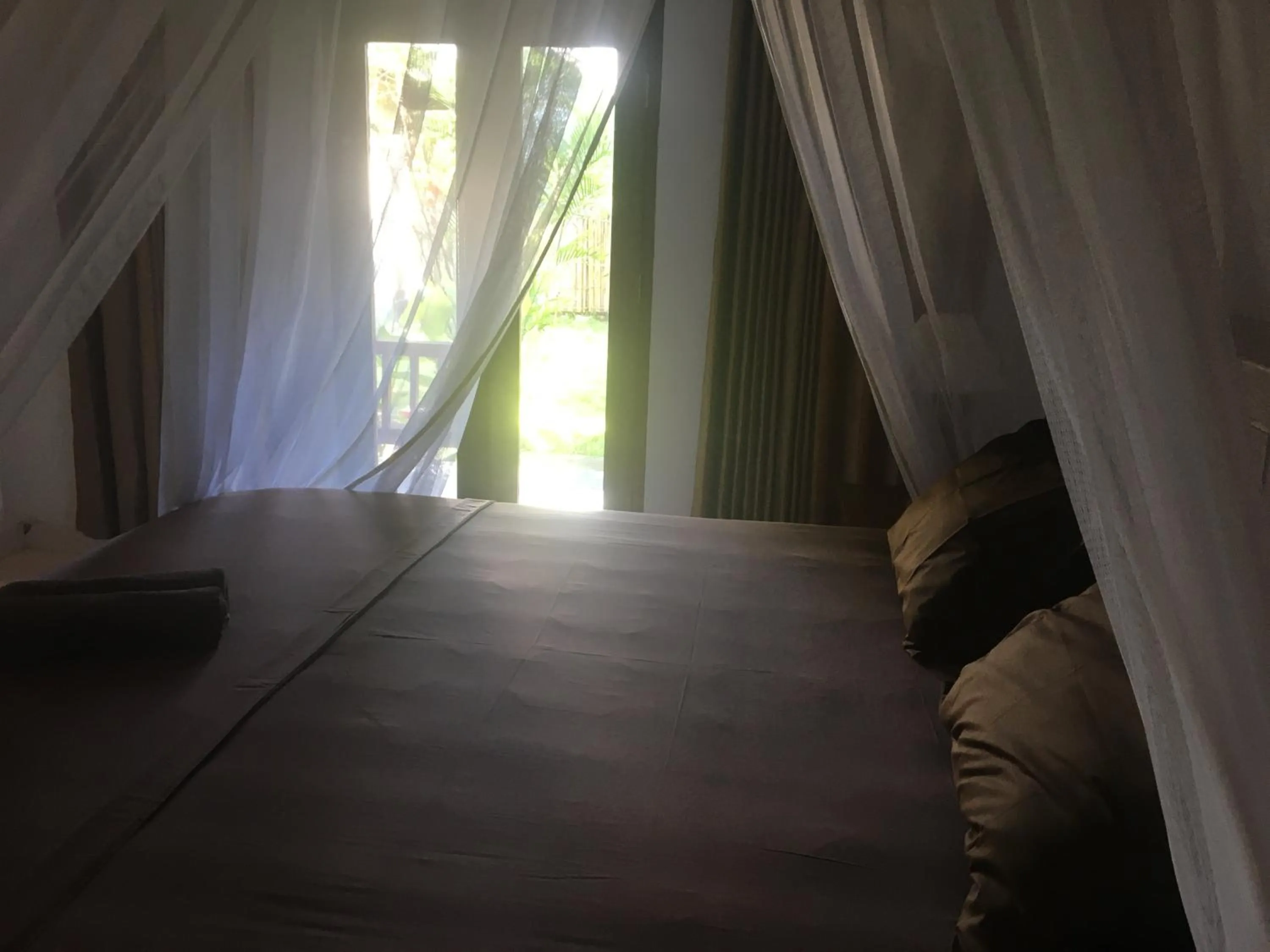 Bed in Puring Bungalows