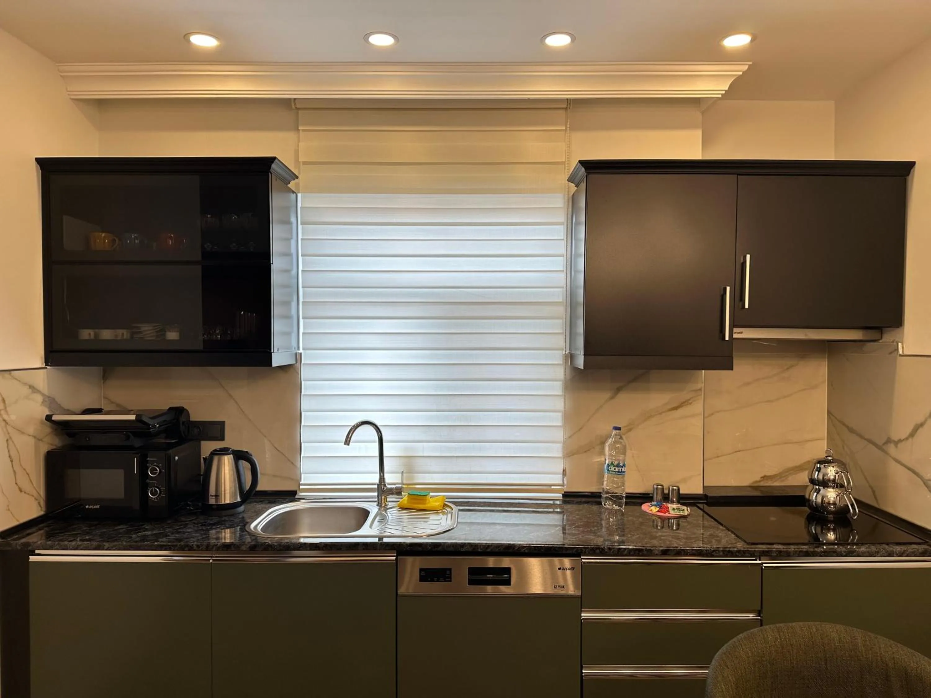 Kitchen or kitchenette in BayMari Suites City Life