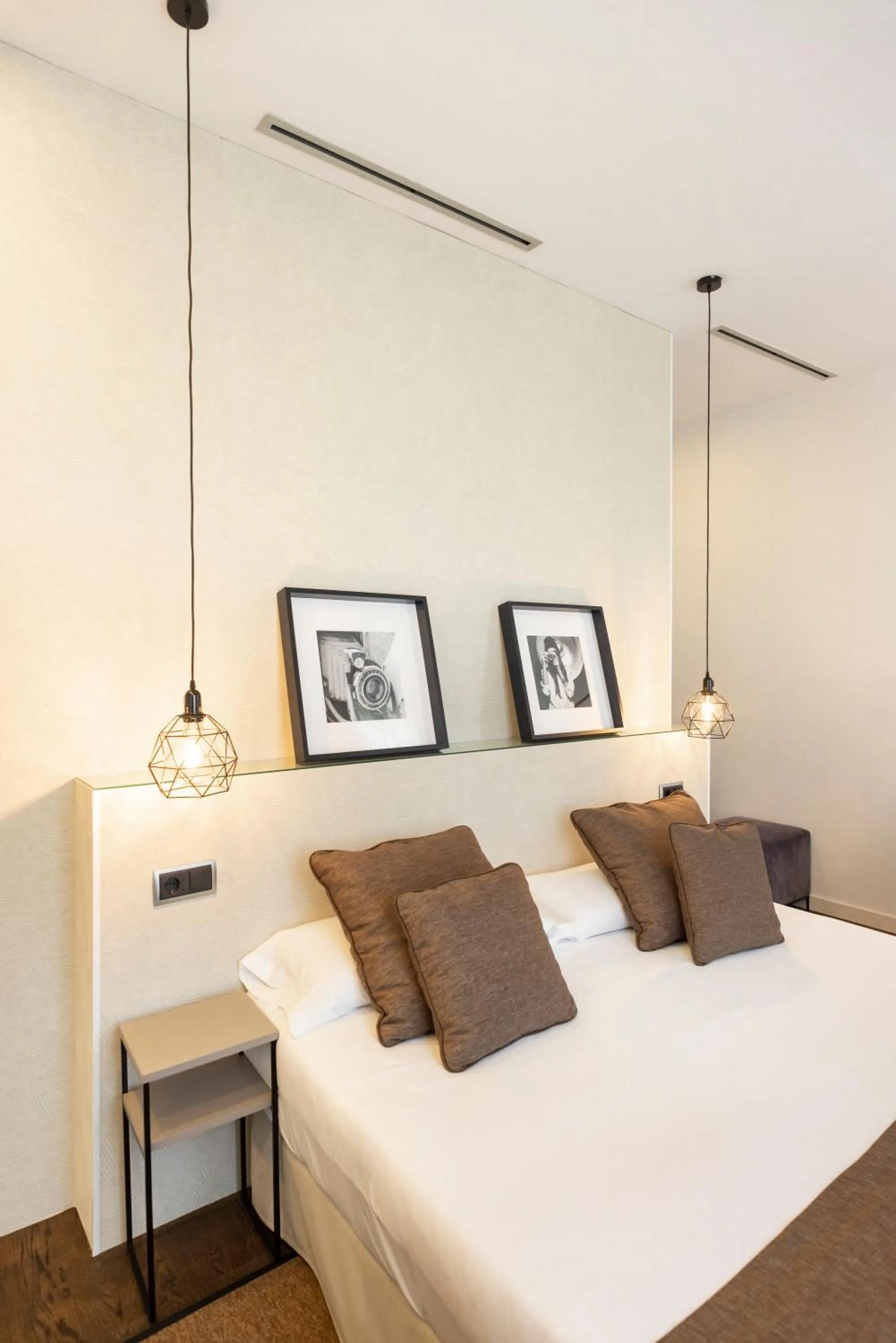 Bed in Blanq Carmen Hotel