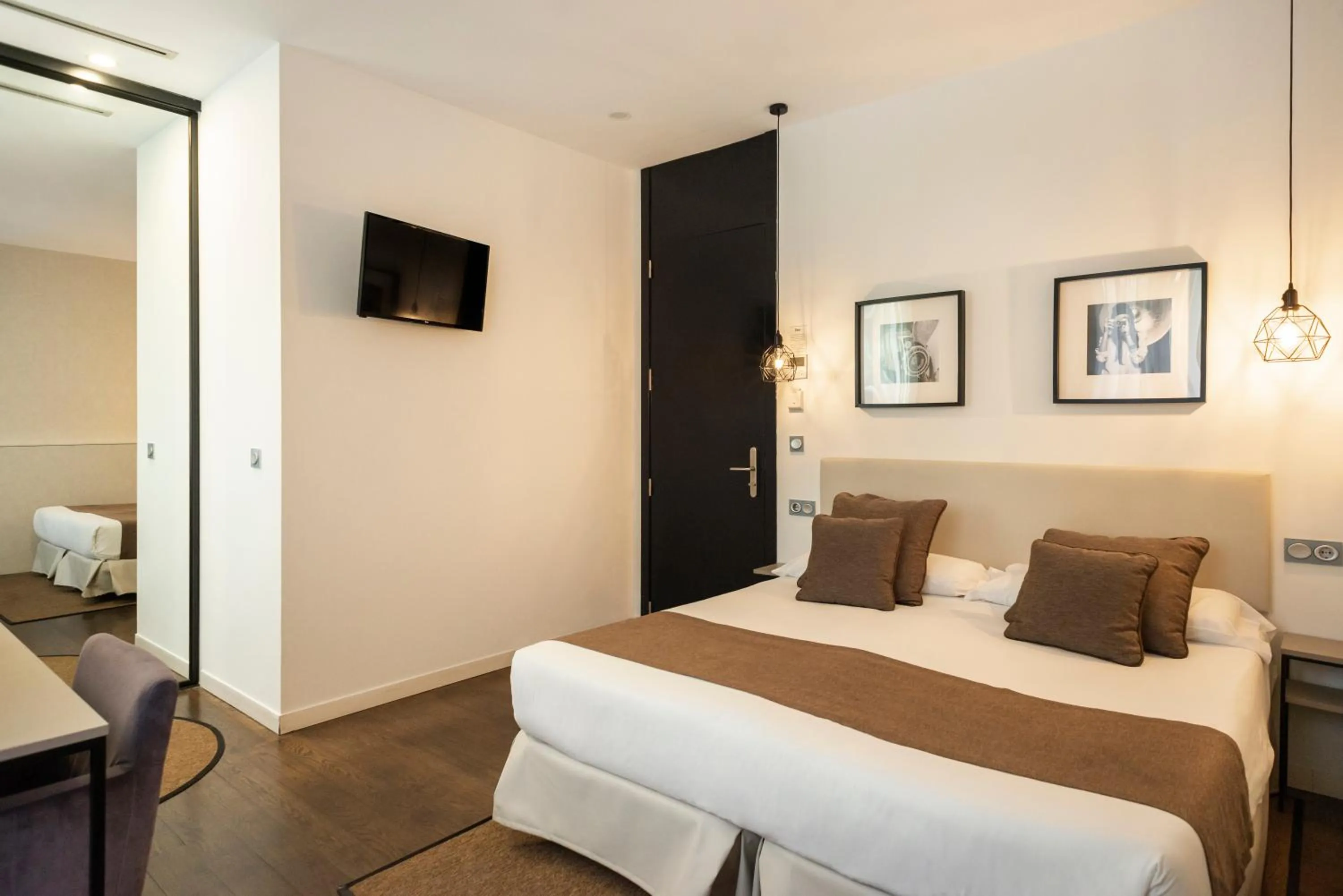 Bed in Blanq Carmen Hotel