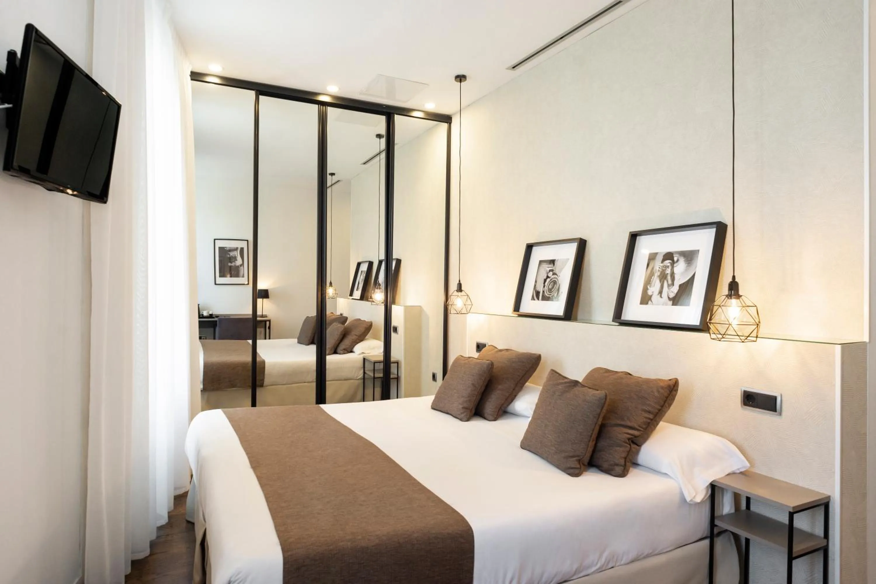 Bed in Blanq Carmen Hotel