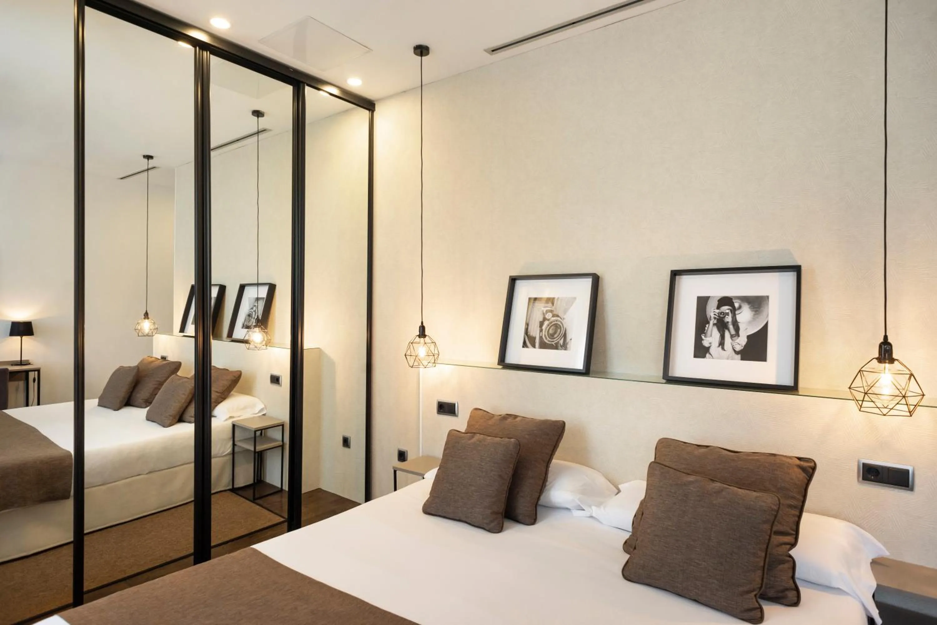 Bed in Blanq Carmen Hotel