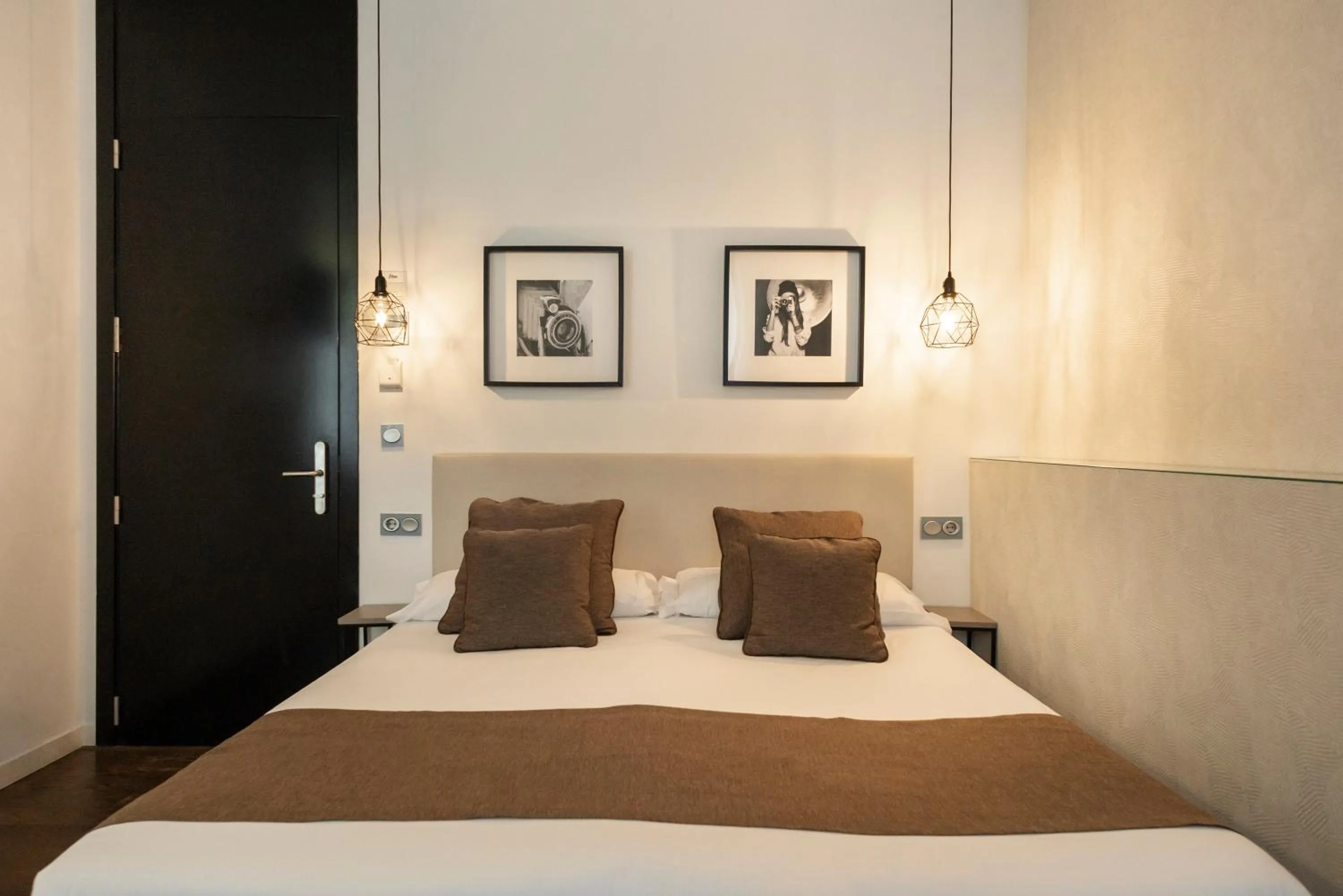 Bed in Blanq Carmen Hotel