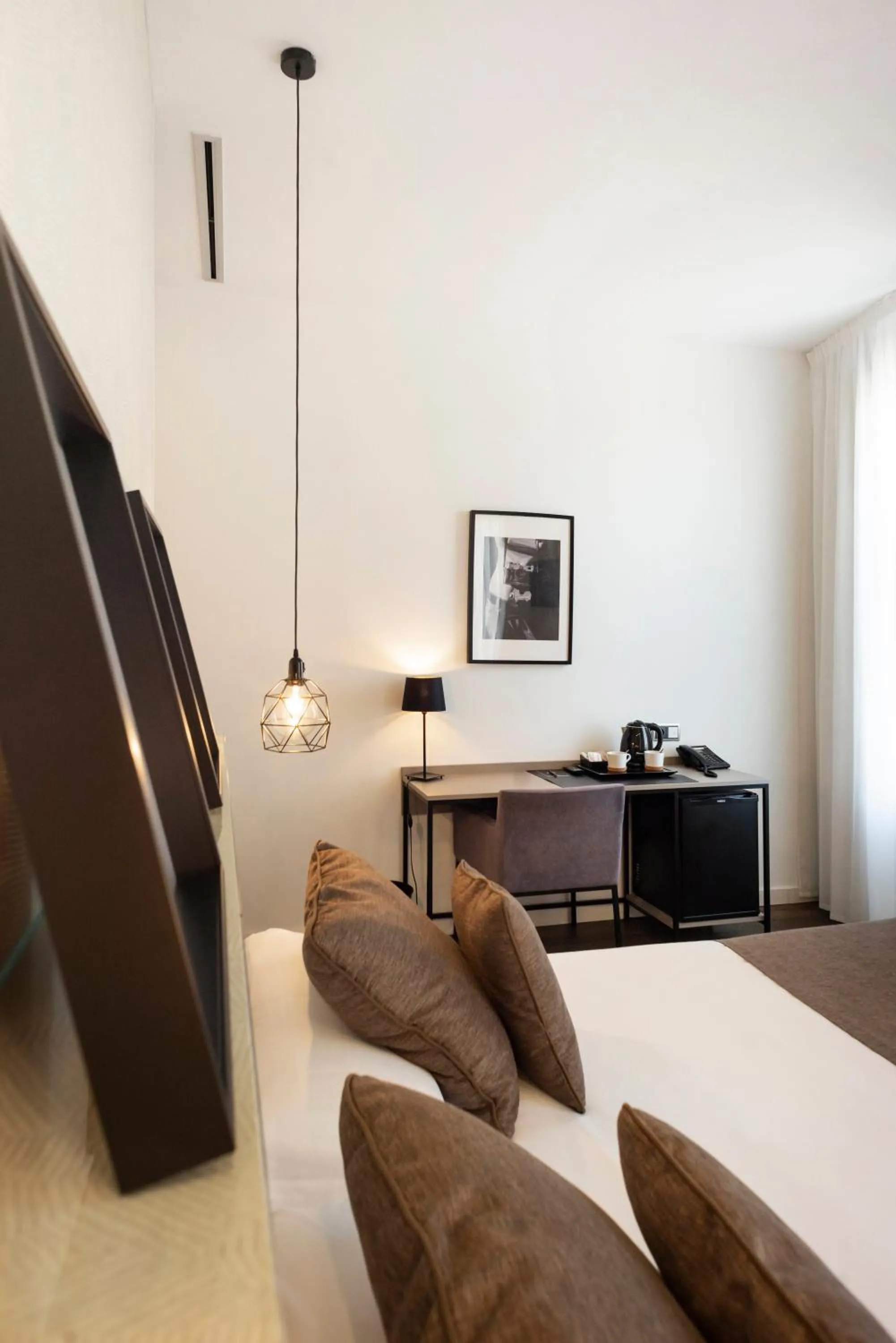 Bed in Blanq Carmen Hotel