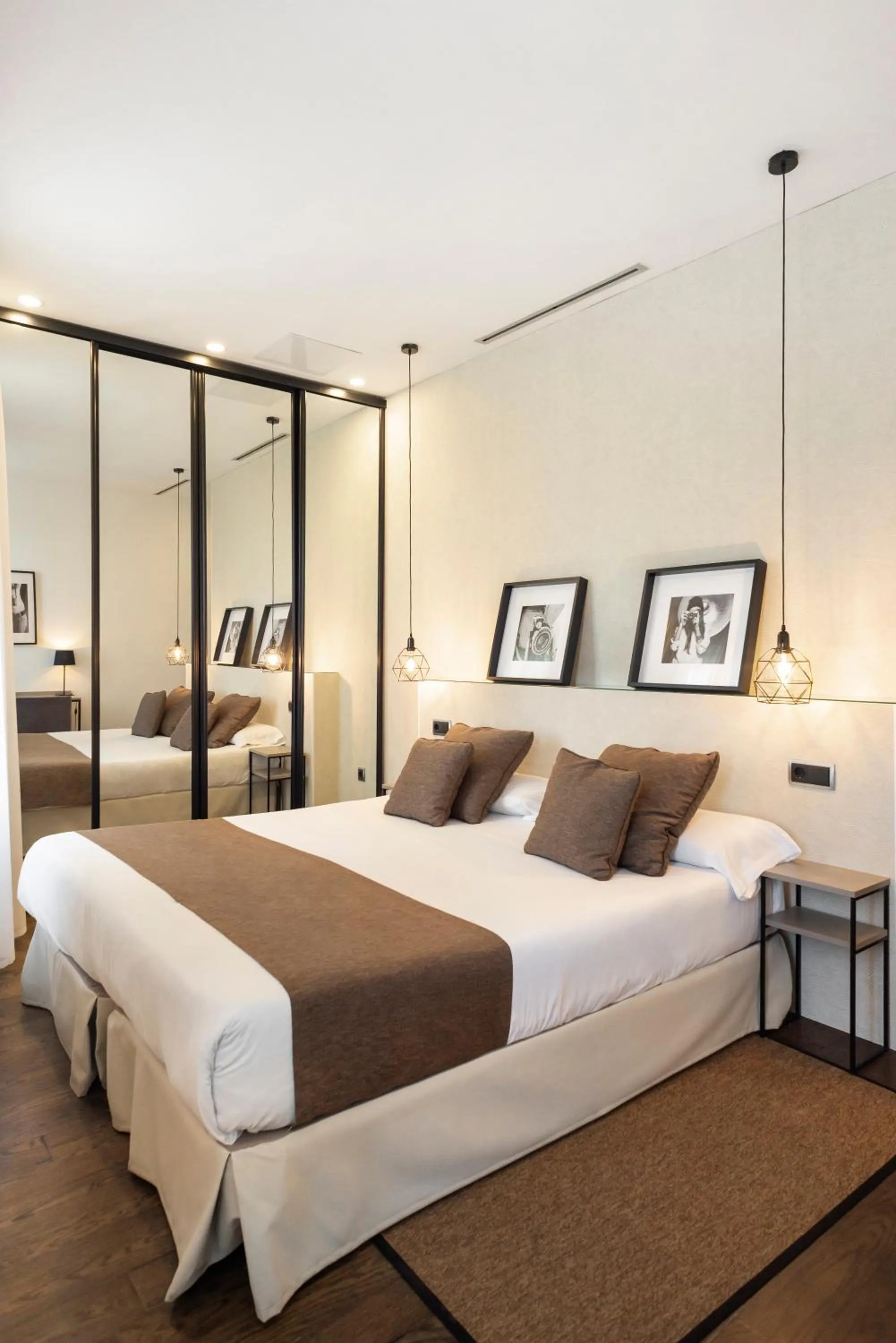 Bed in Blanq Carmen Hotel