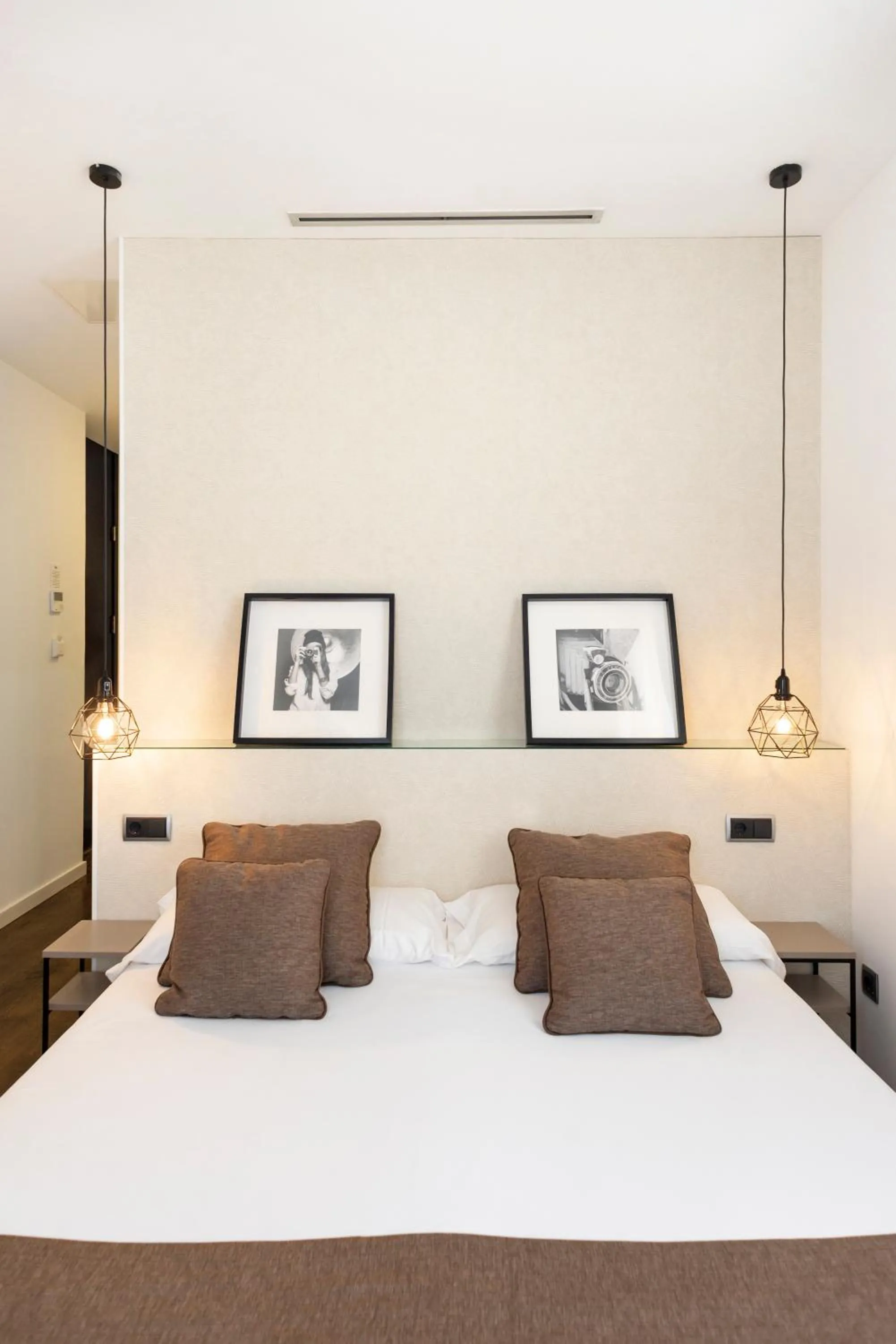 Bed in Blanq Carmen Hotel