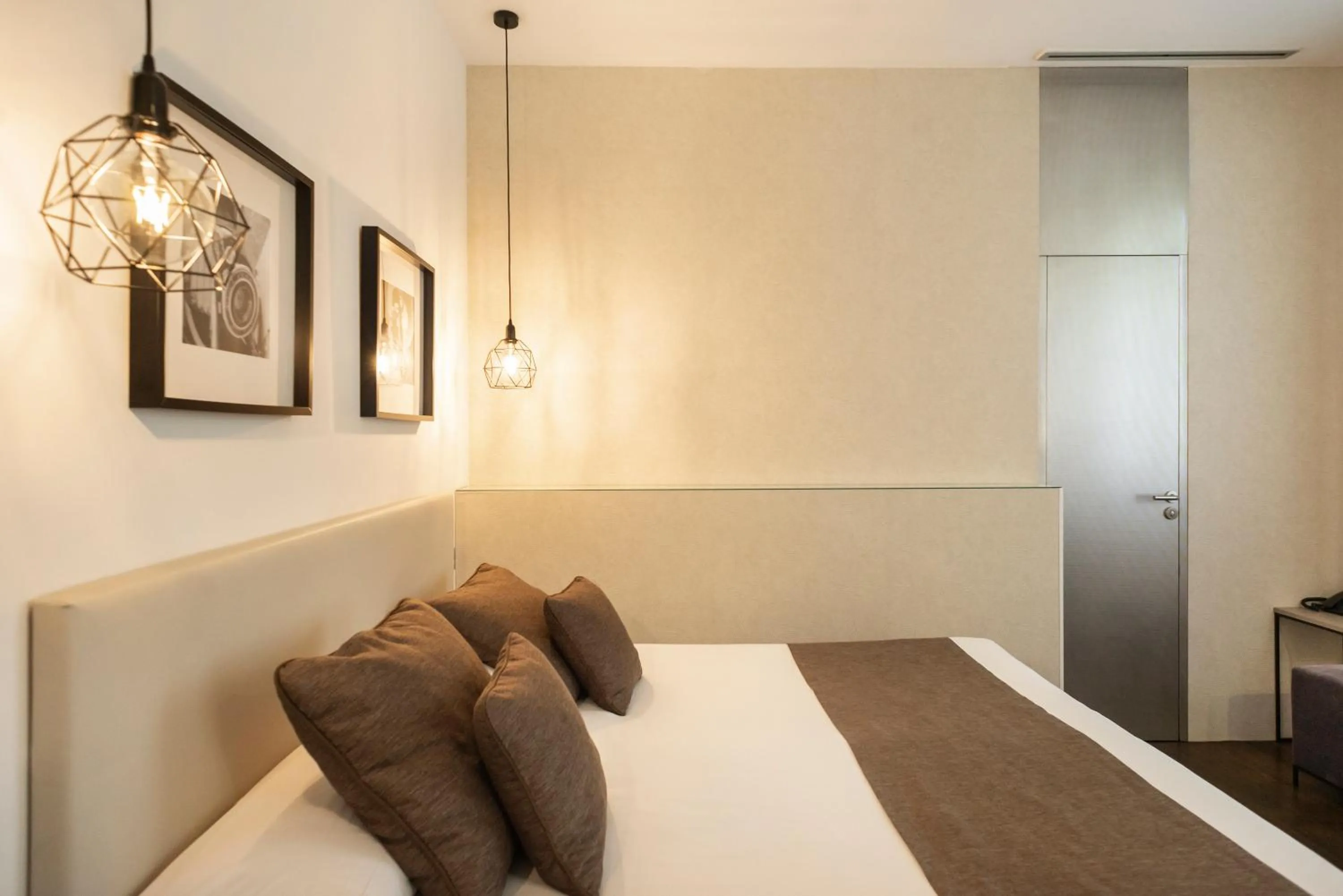 Bed in Blanq Carmen Hotel