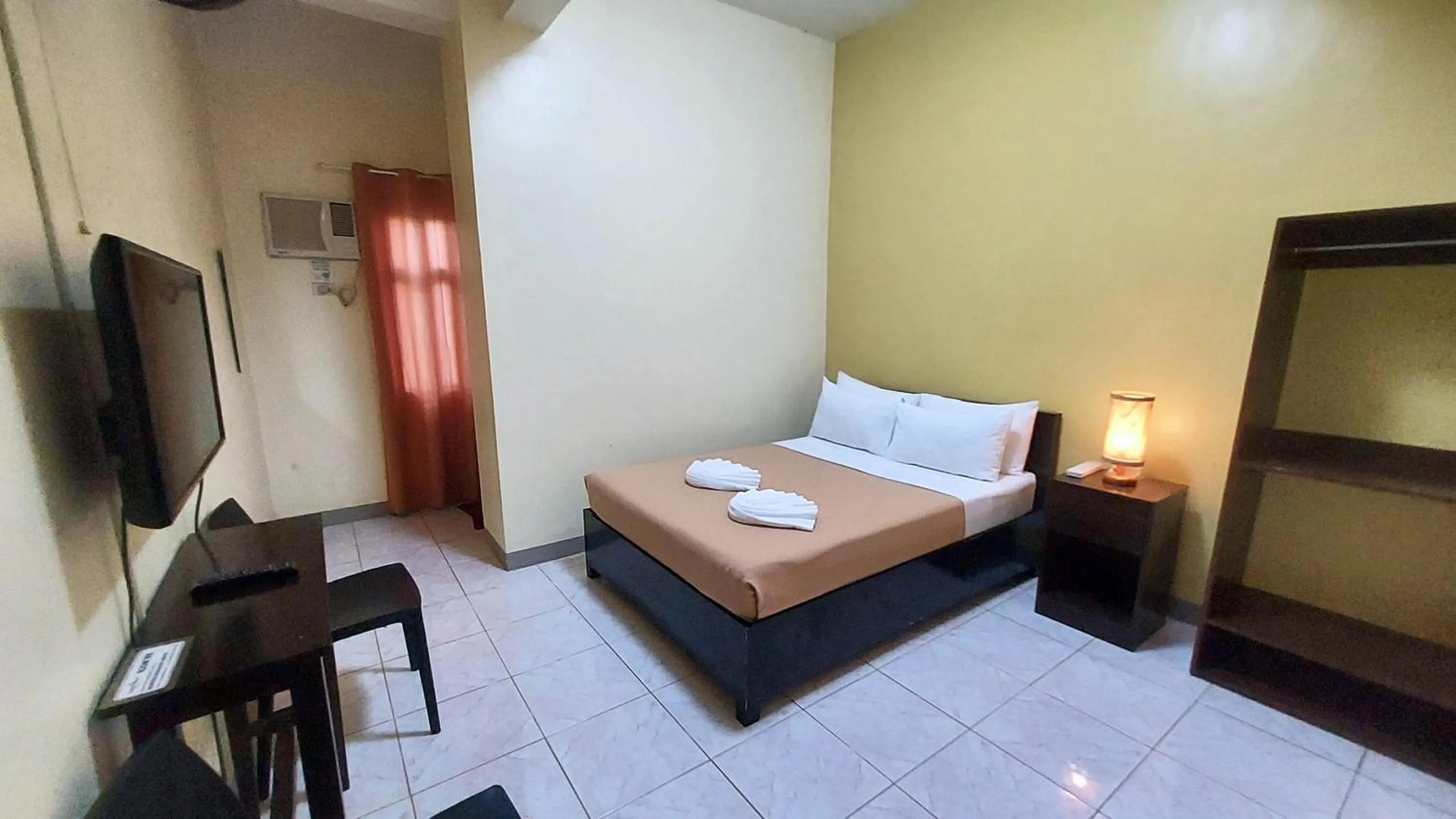 Bed in Coron Vista Lodge