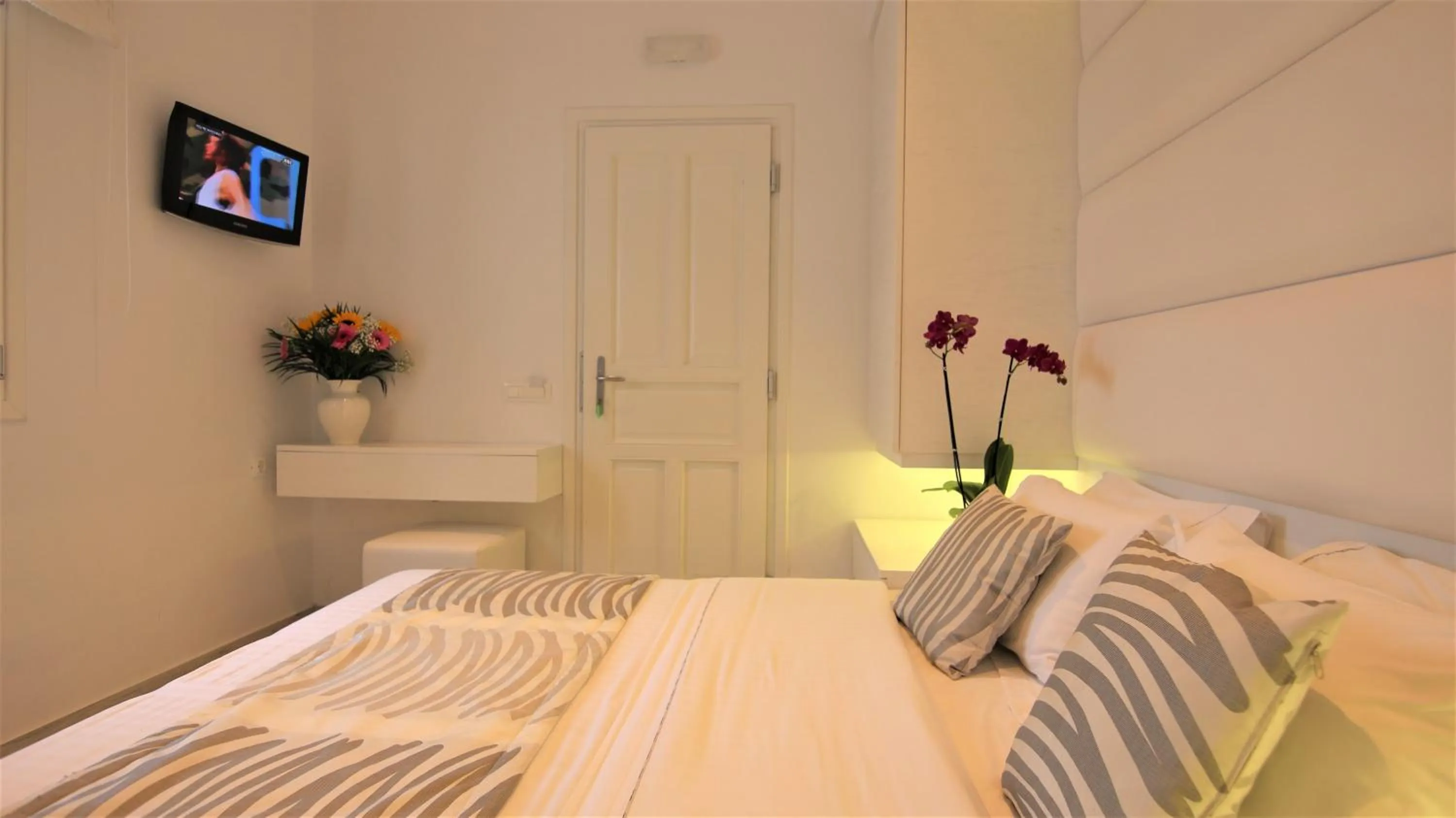 Bed in Damianos Mykonos Hotel