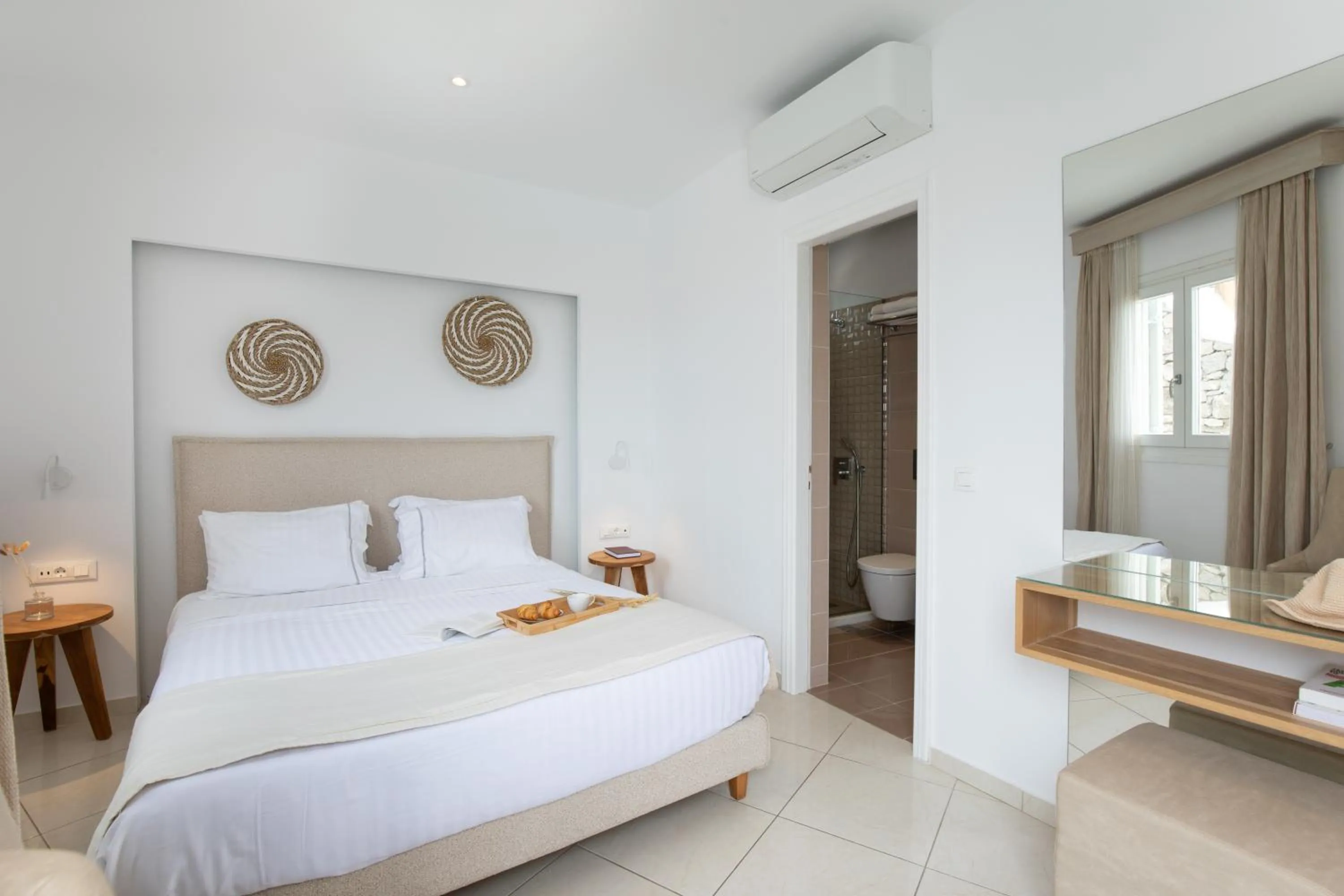 Bed in Damianos Mykonos Hotel