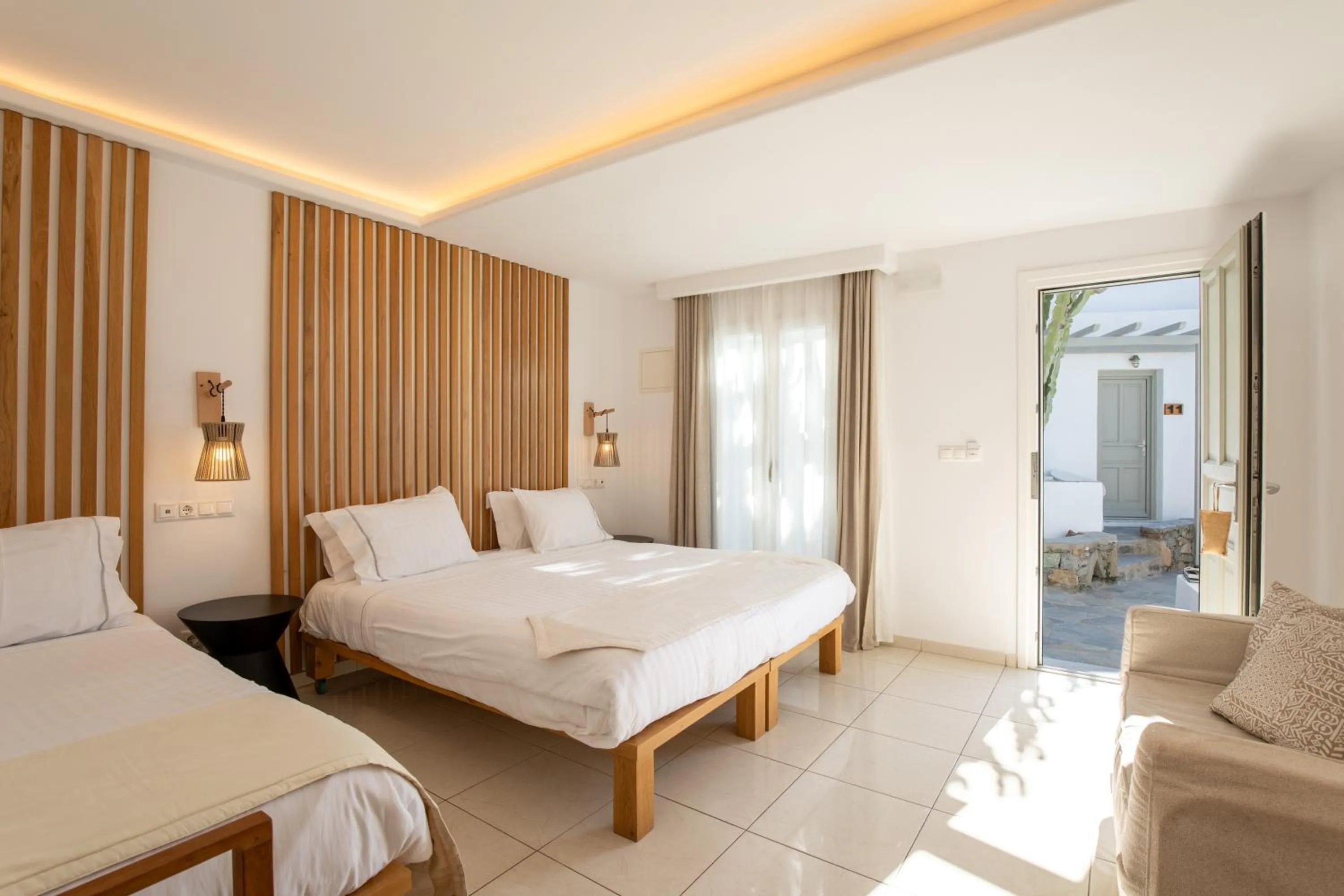 Bed in Damianos Mykonos Hotel