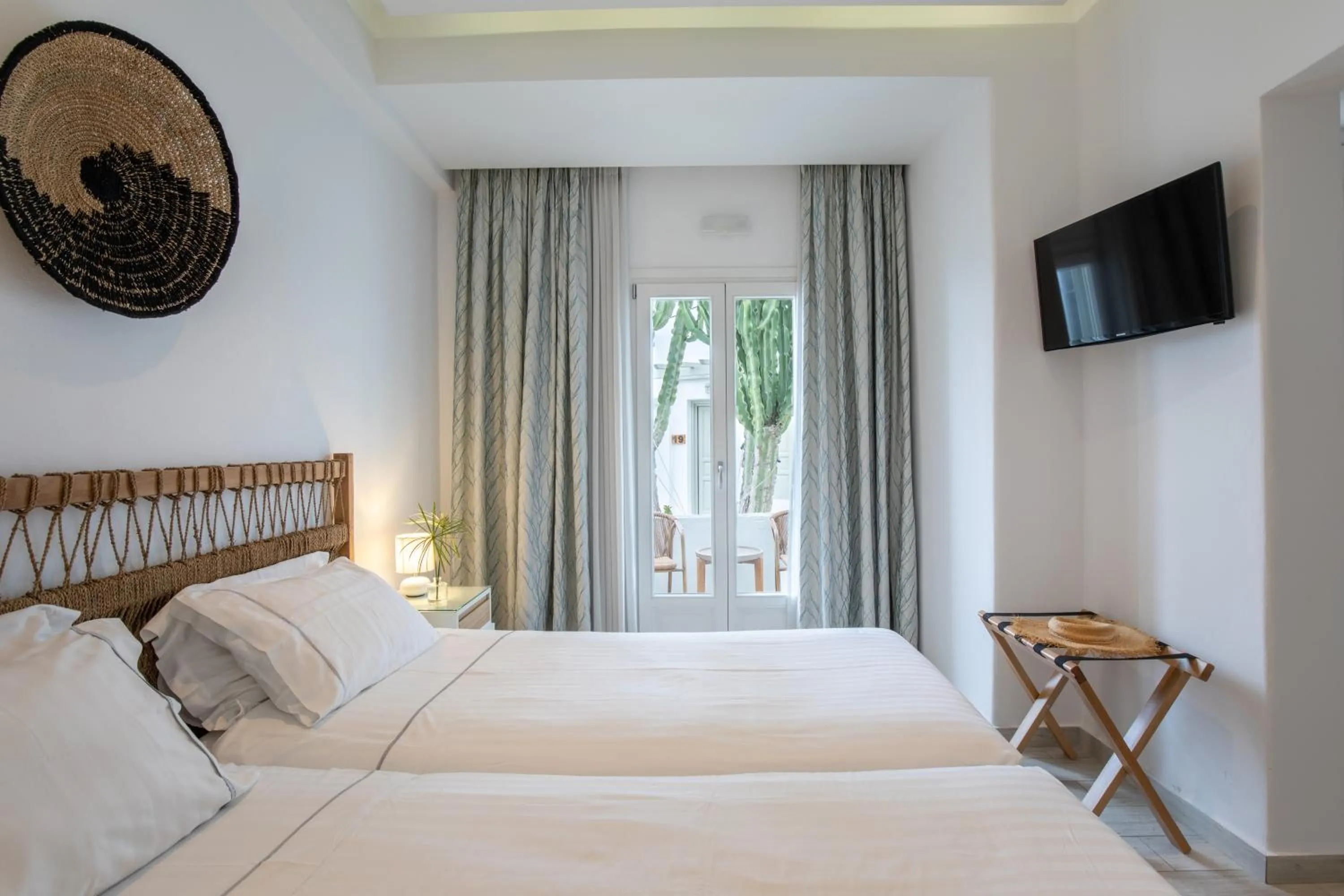 Bed in Damianos Mykonos Hotel