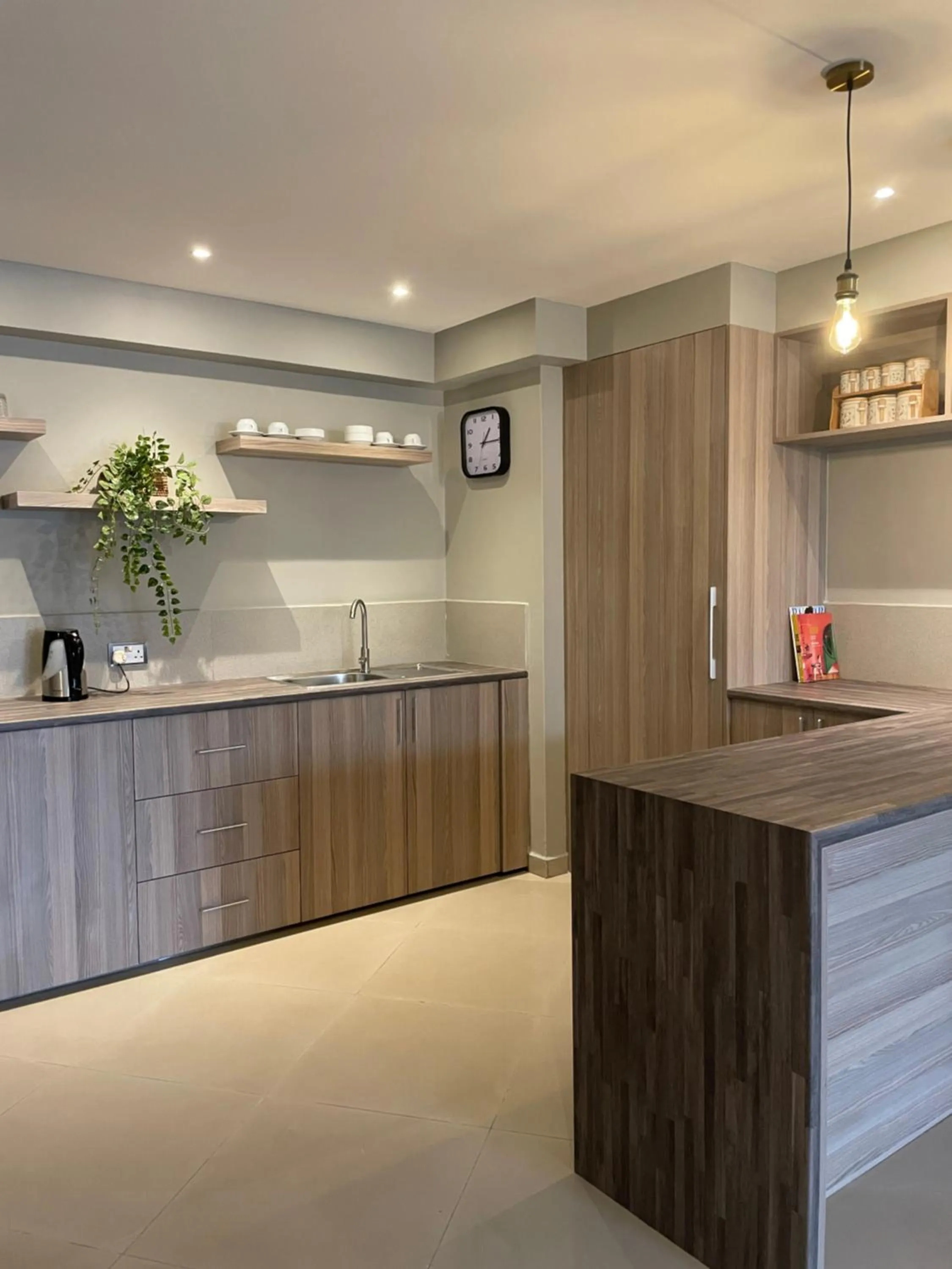 Kitchen or kitchenette in Meilin International Hotel