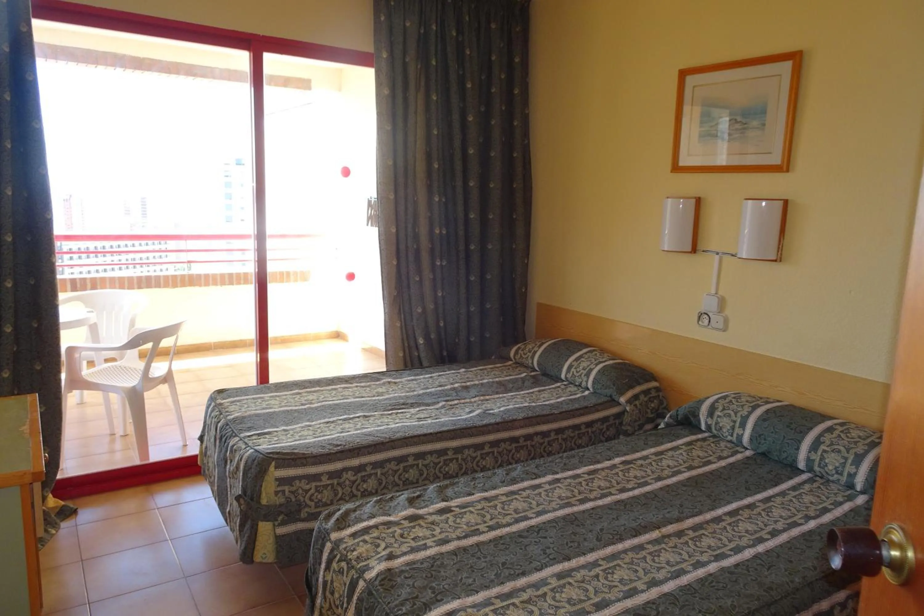 Bed in Evamar Apartments