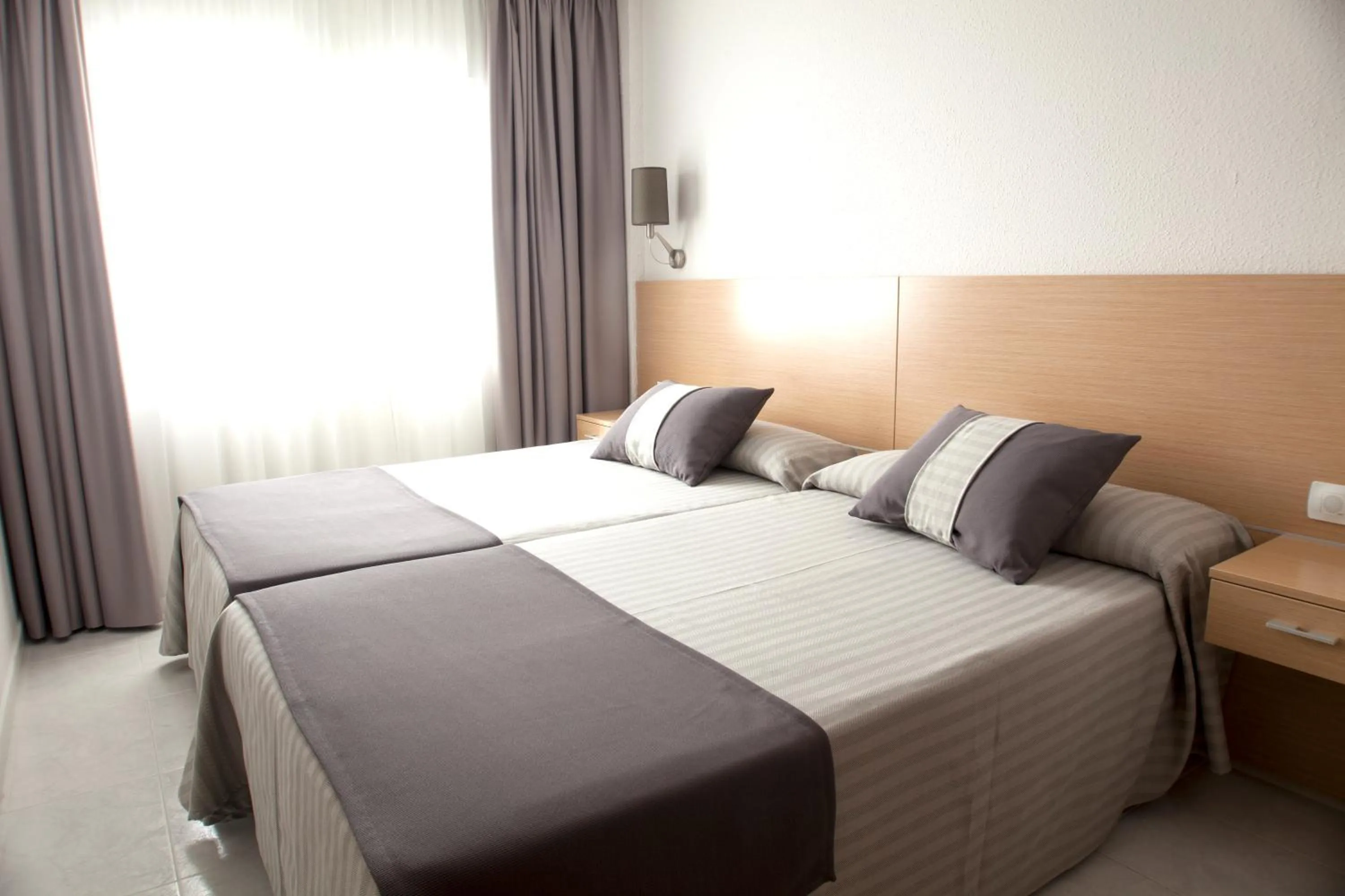 Bed in Aparthotel Acuazul