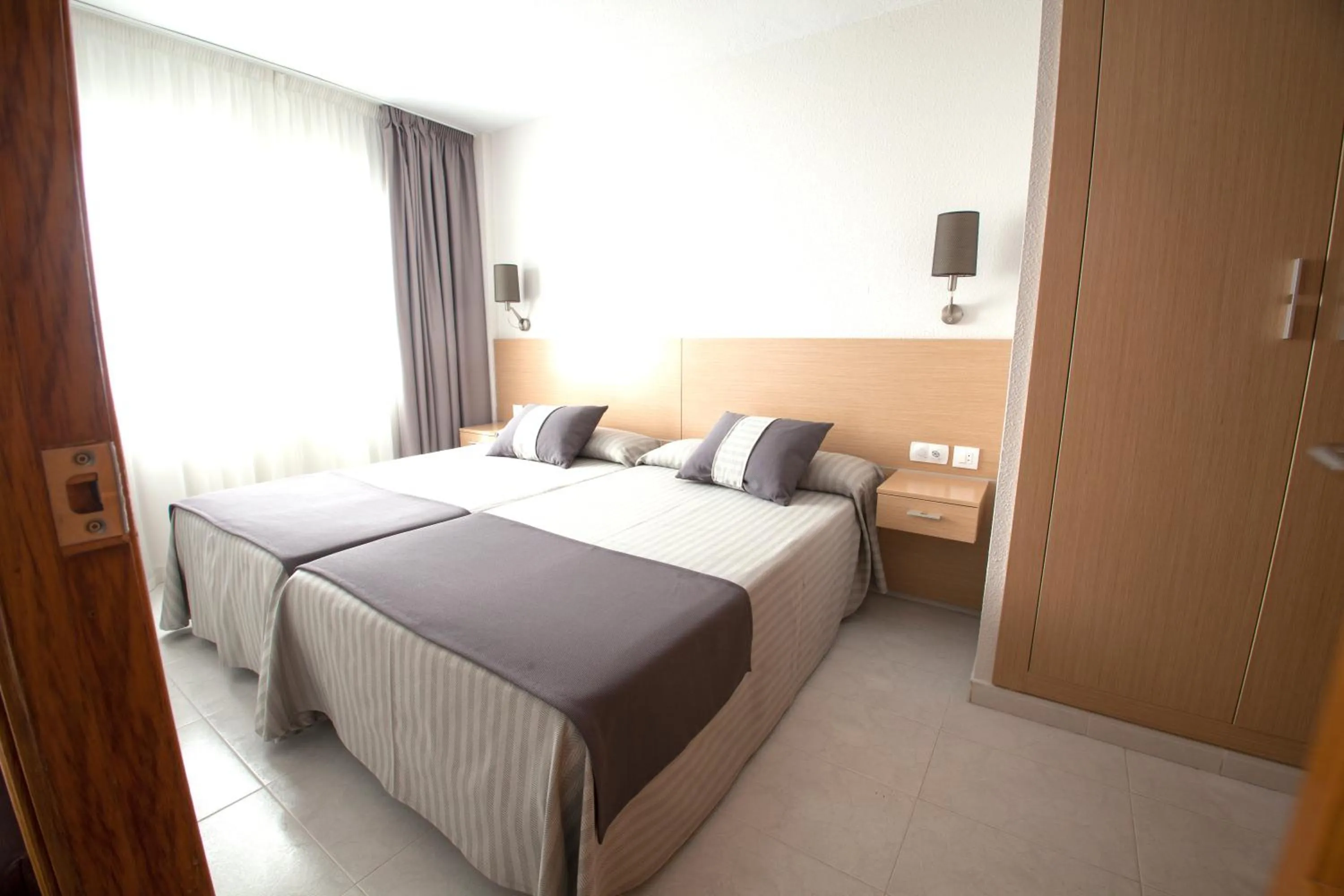 Bed in Aparthotel Acuazul